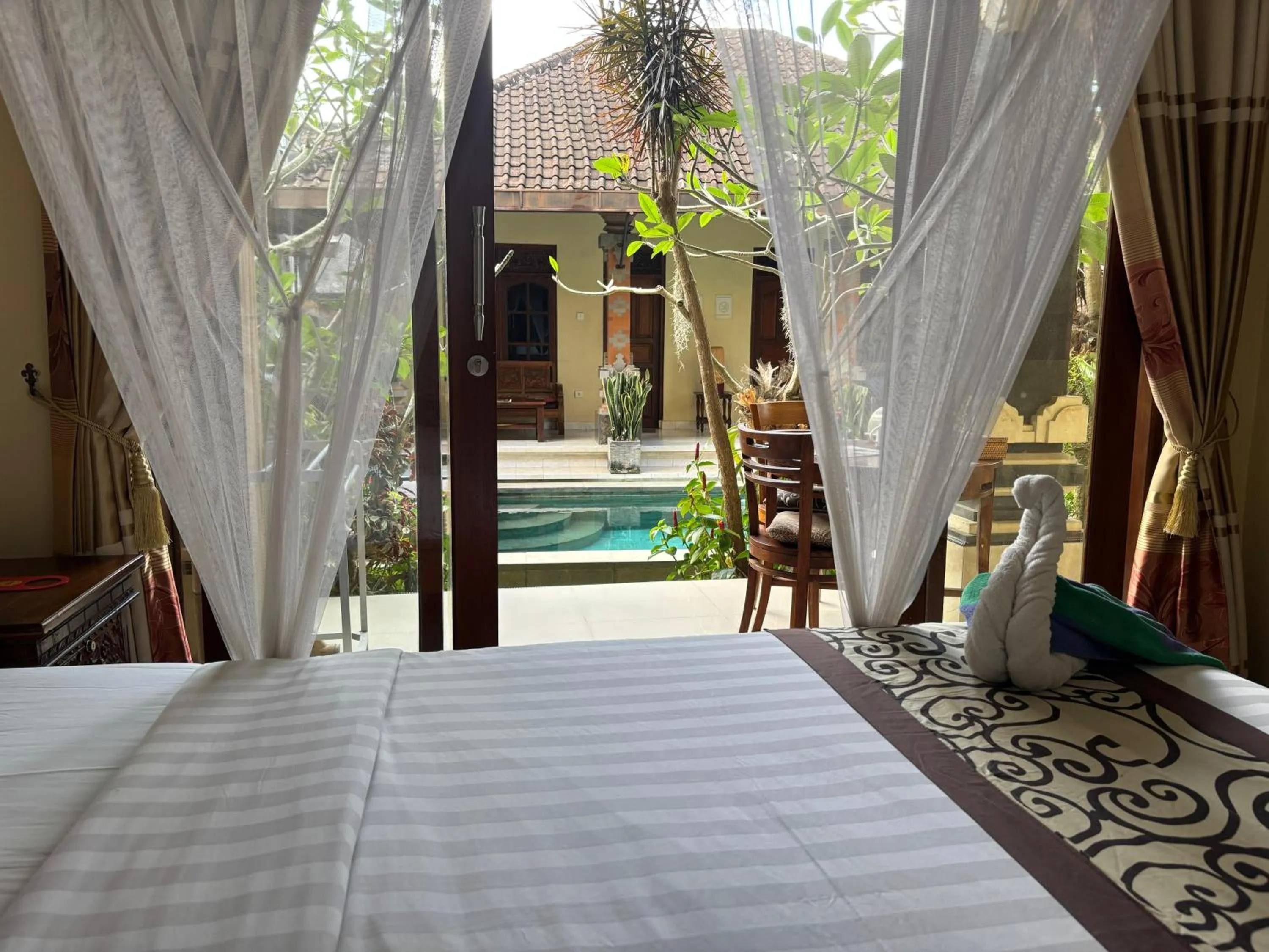 Bed in Suparsa's Homestay