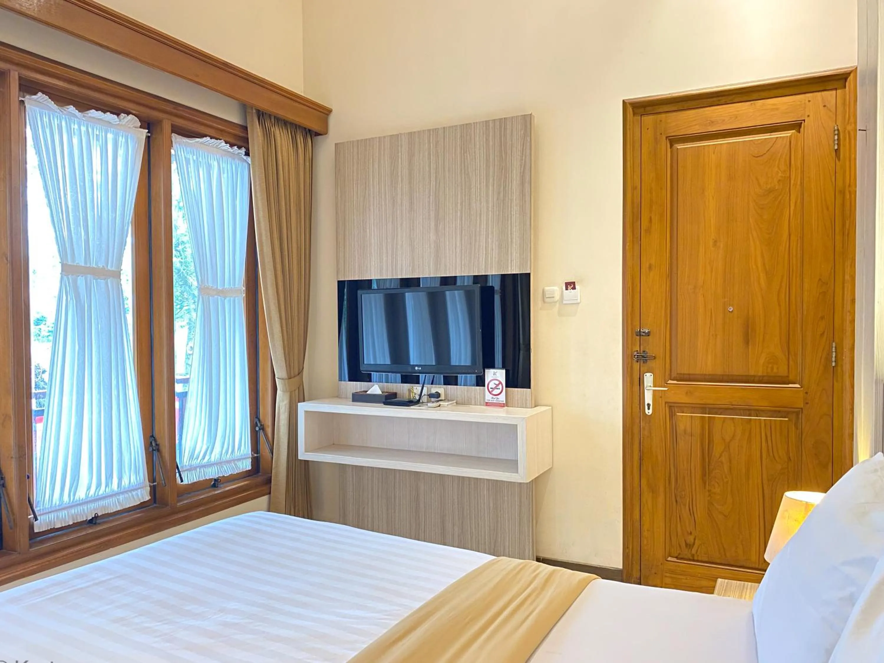Bed in Kertanegara Premium Guest House