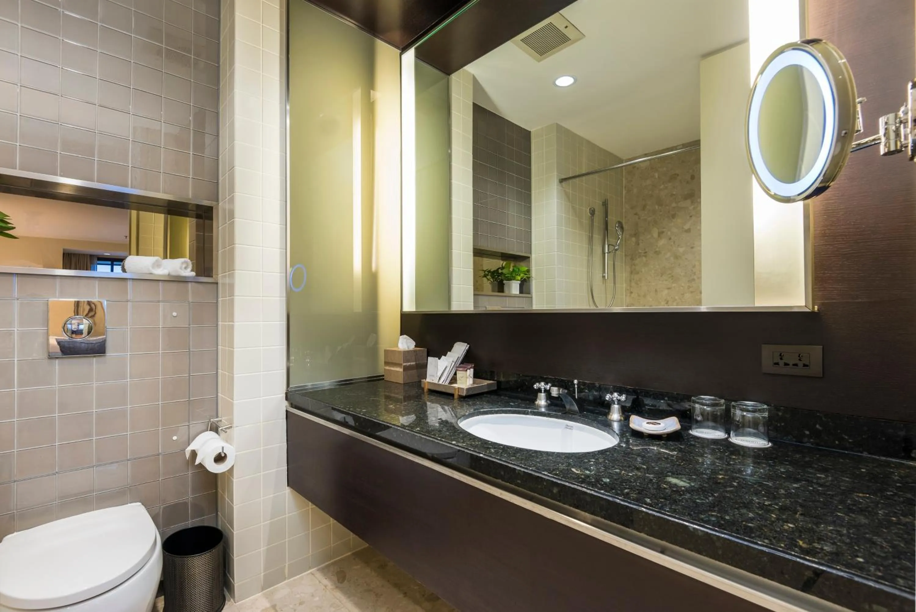Bathroom in Emporium Suites by Chatrium