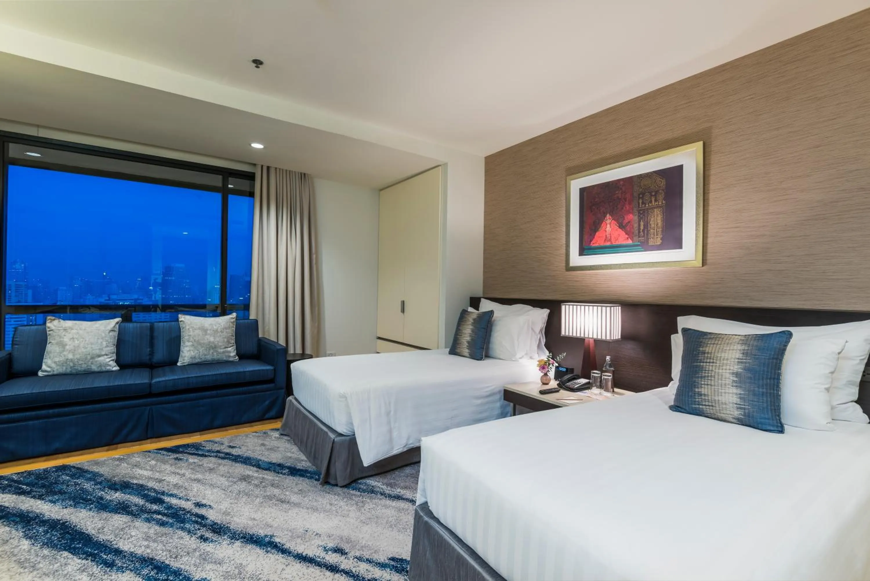 Bed in Emporium Suites by Chatrium