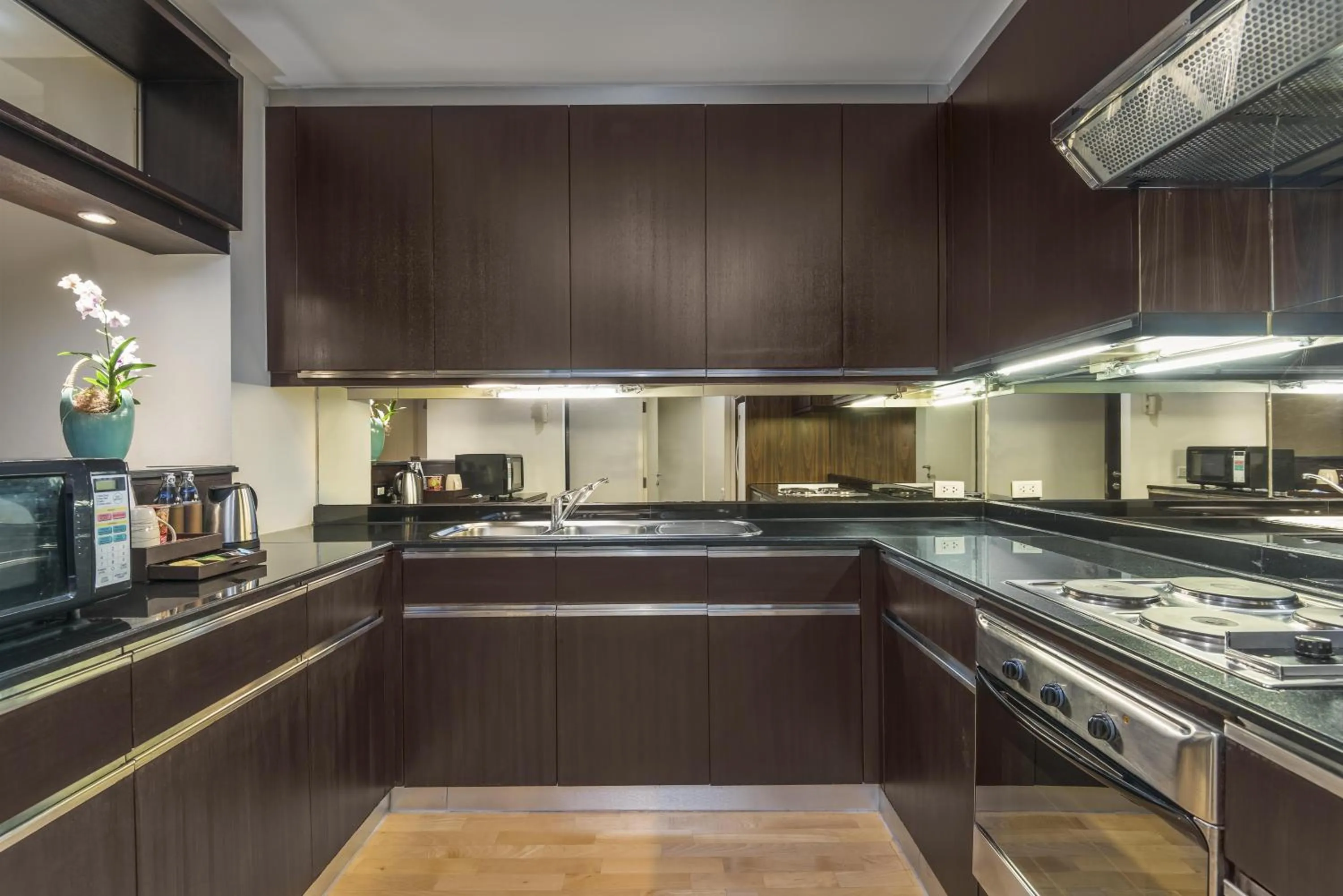 kitchen in Emporium Suites by Chatrium