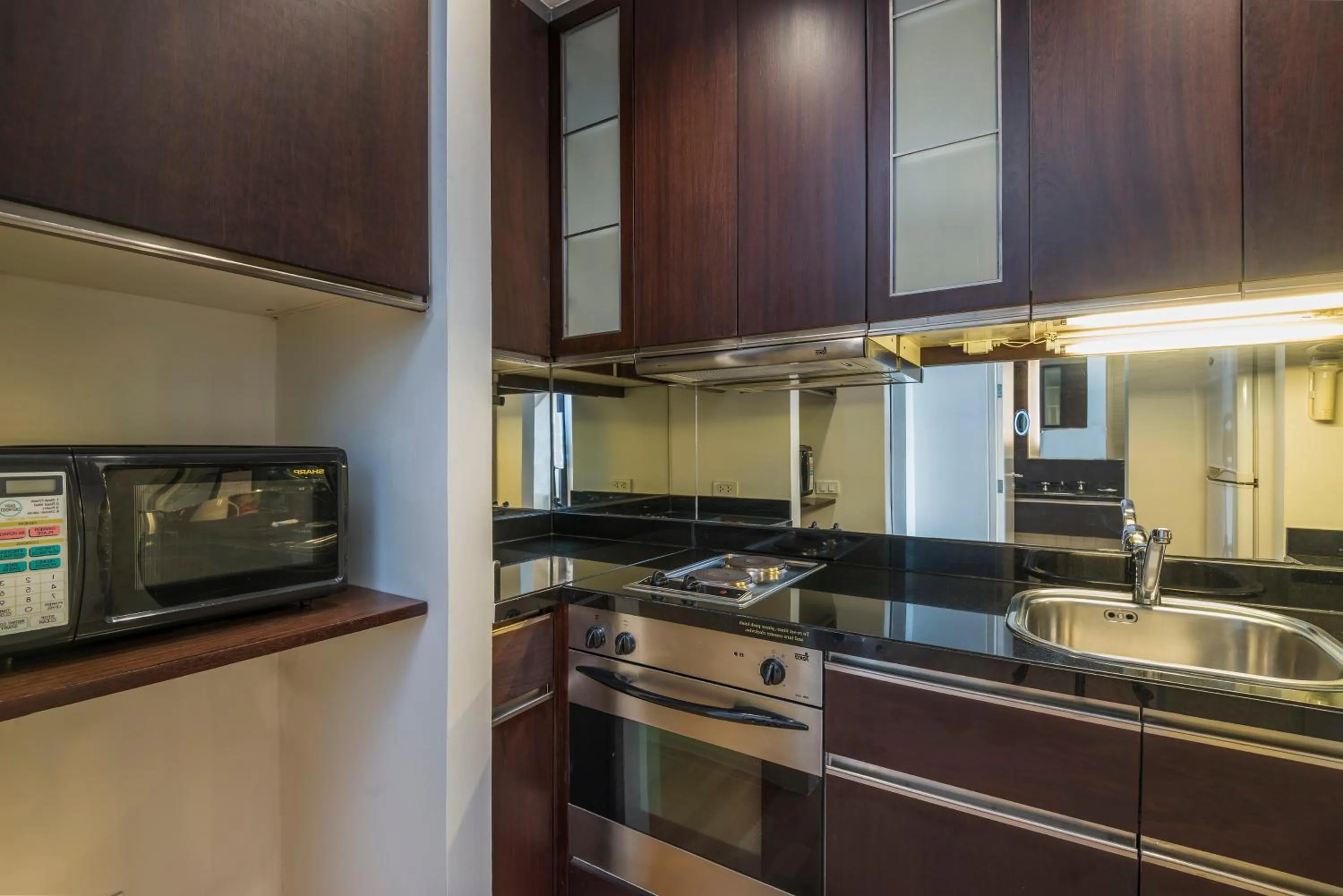 kitchen in Emporium Suites by Chatrium