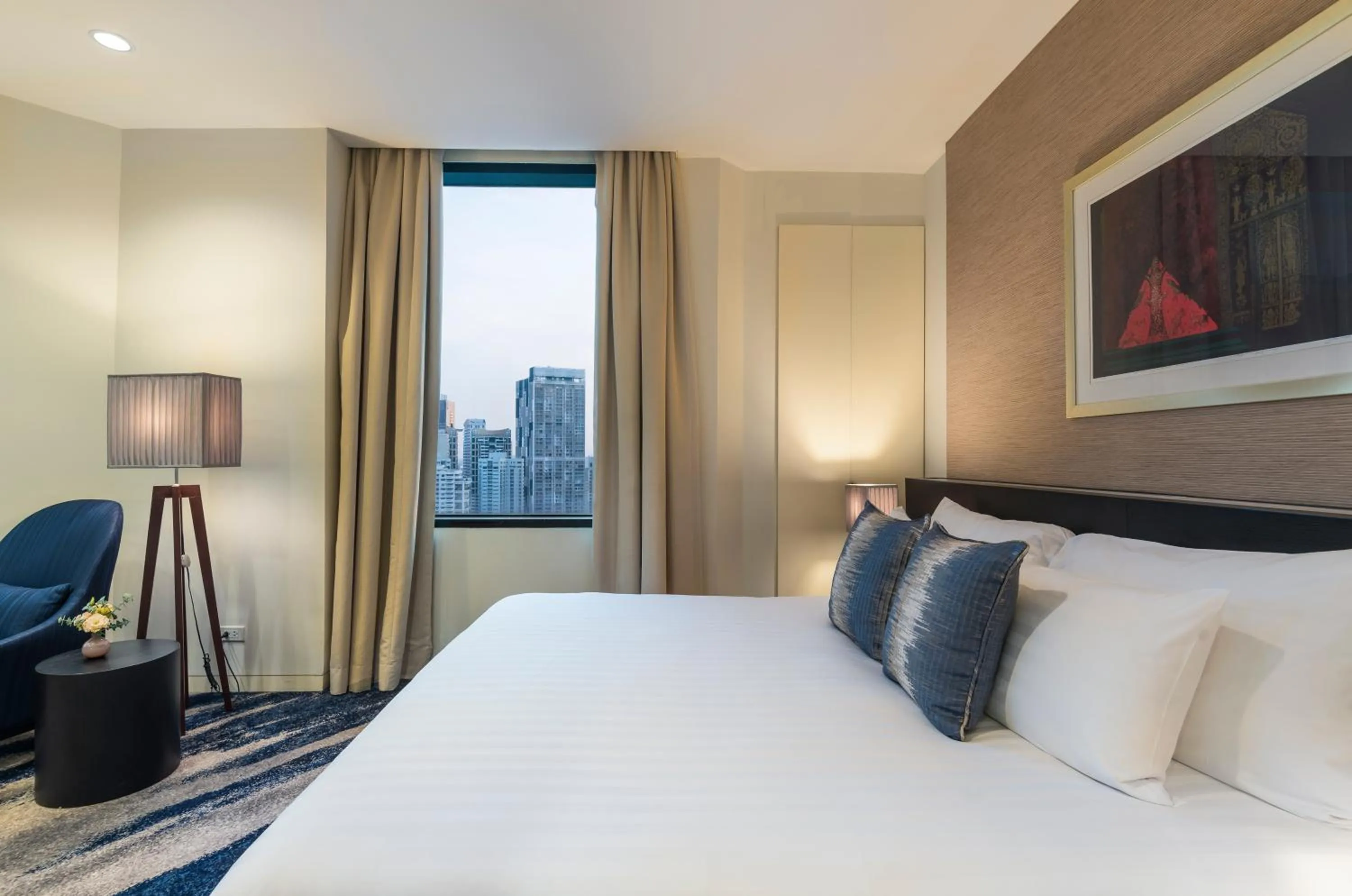 Bed in Emporium Suites by Chatrium