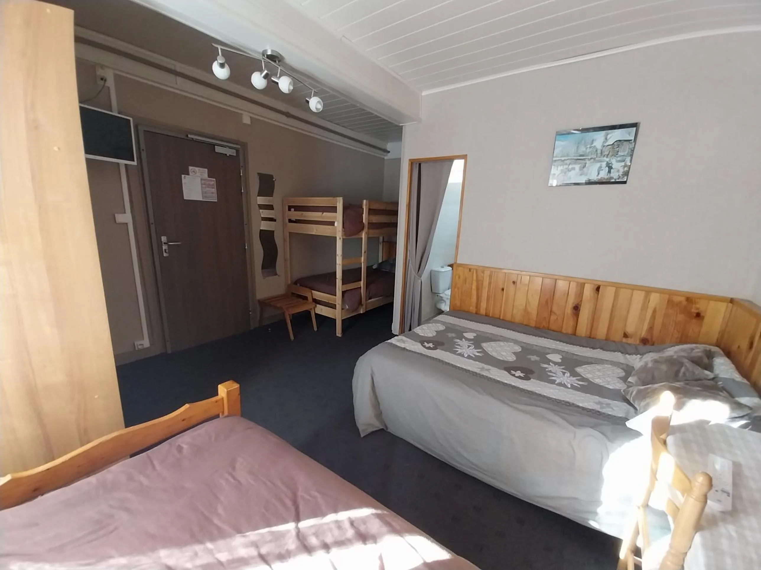 Bed in Hôtel les Deux Cols