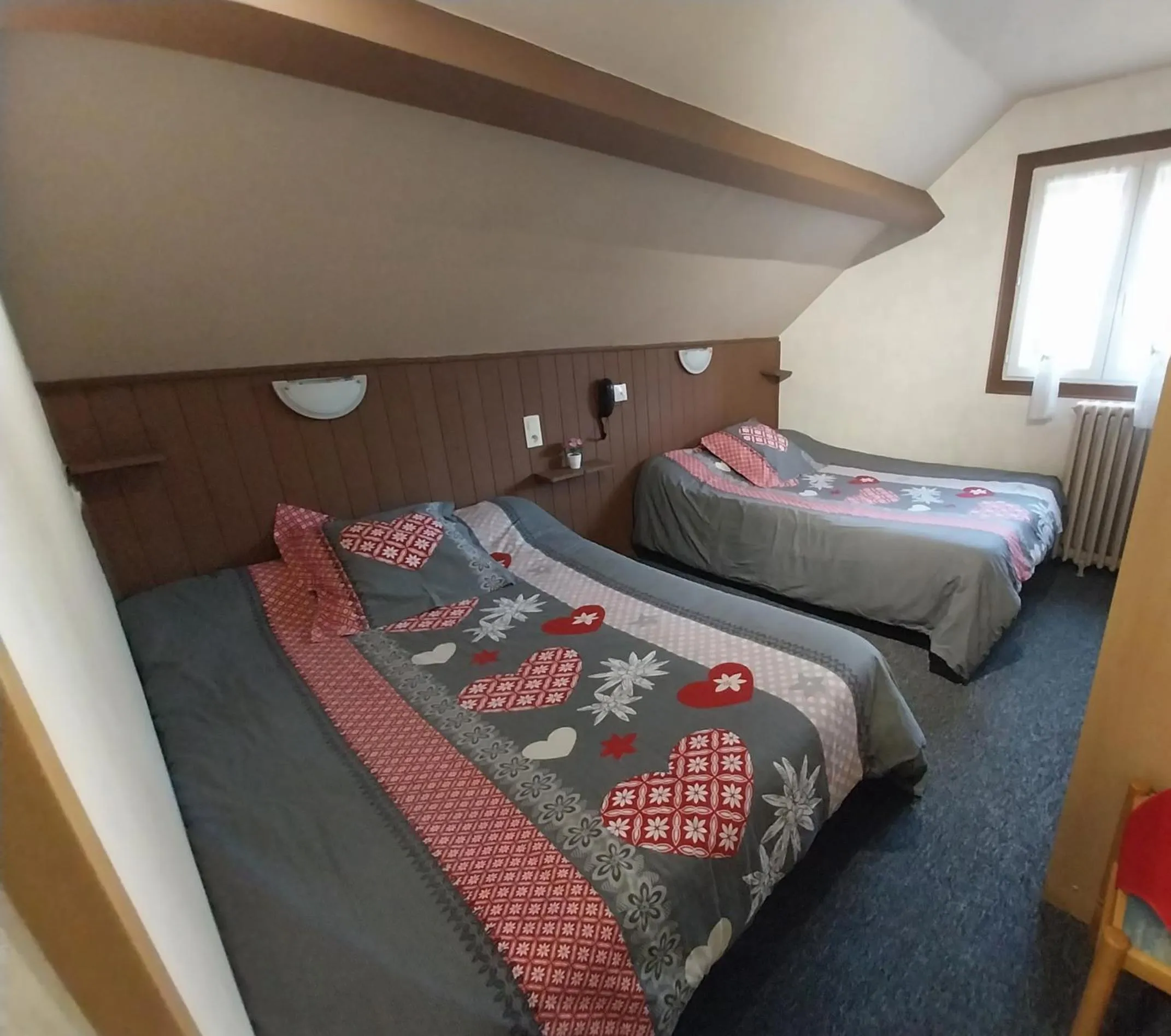 Bed in Hôtel les Deux Cols