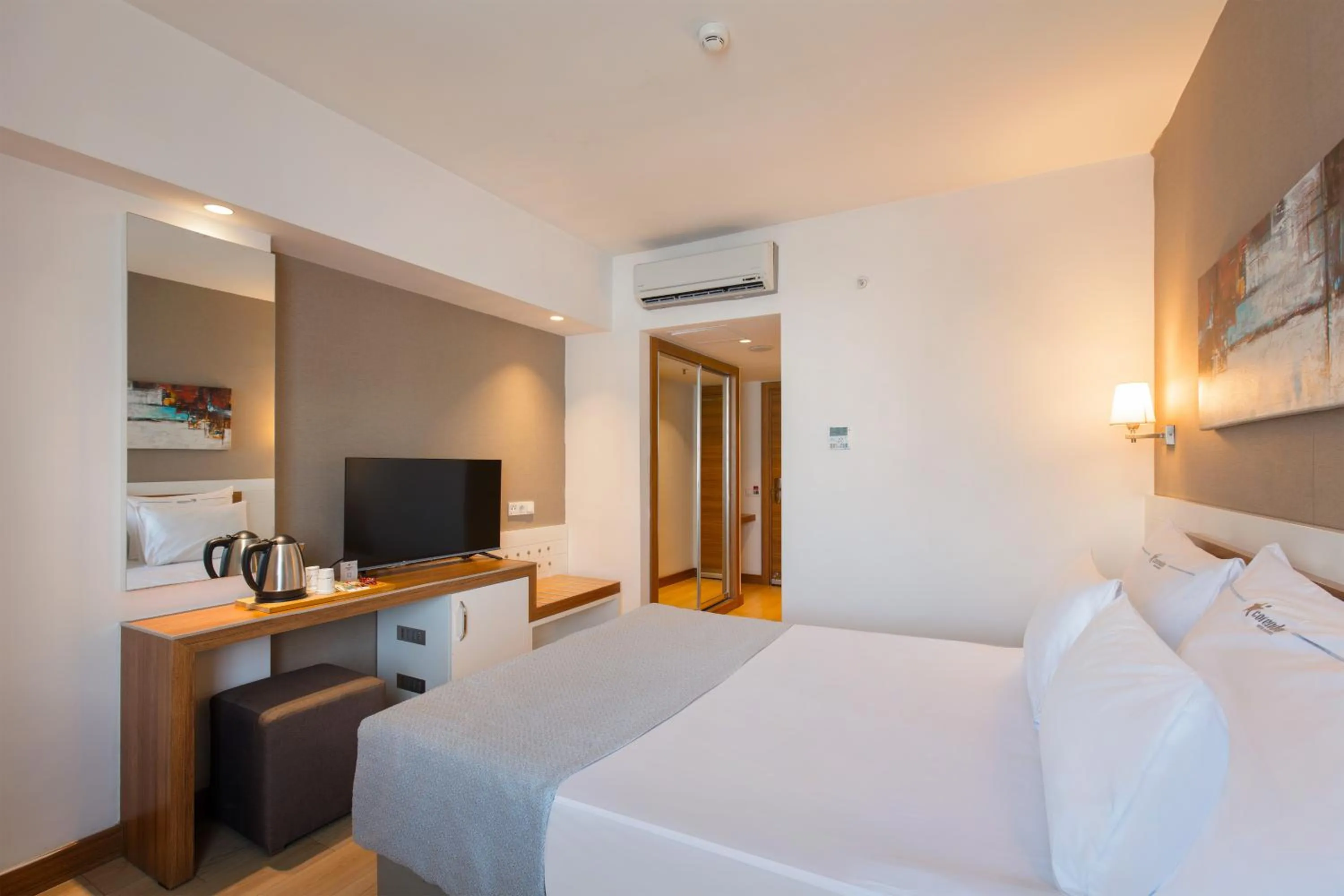 Bed in Grand Park Lara Hotel