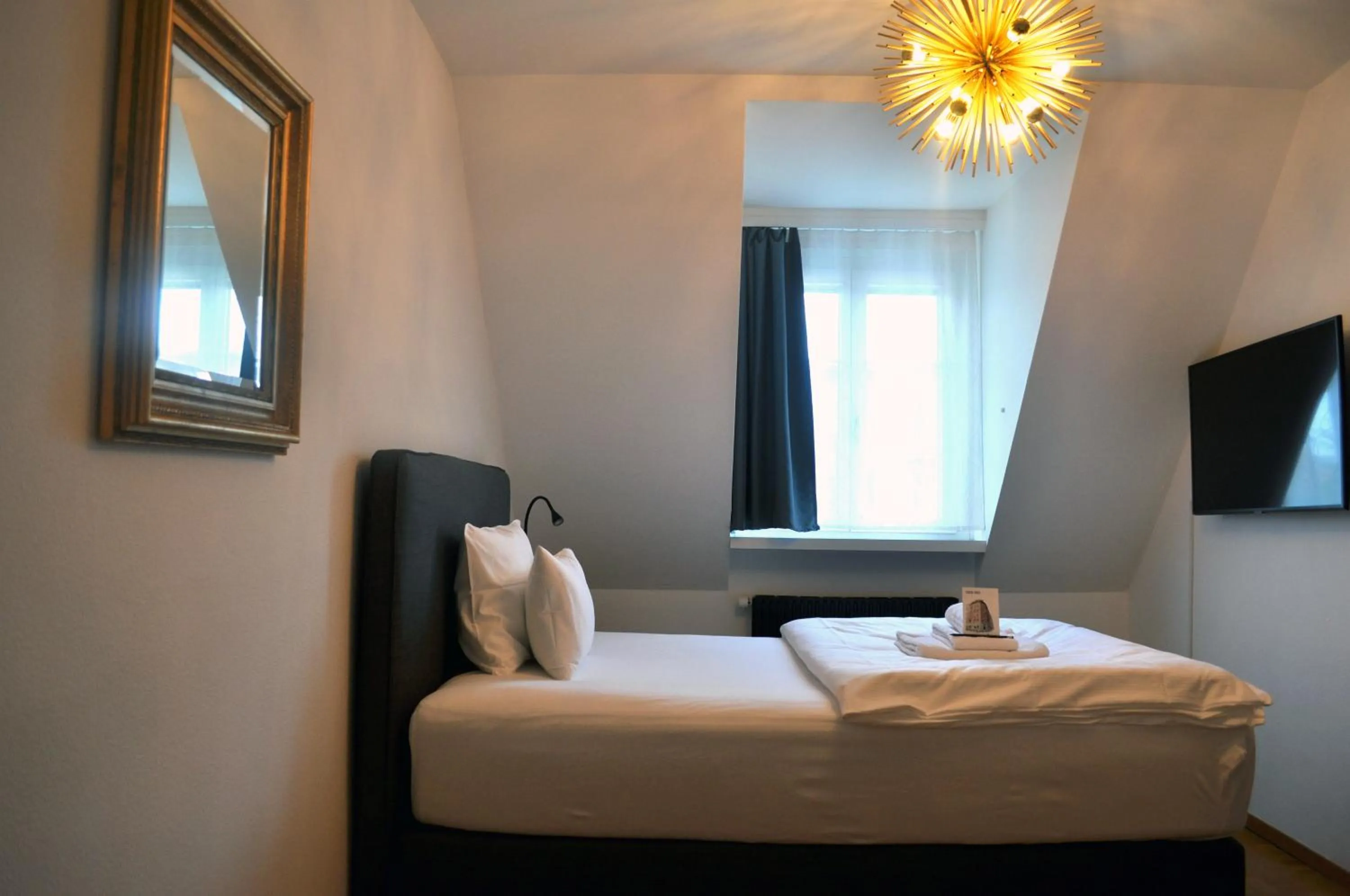 TV and multimedia, Bed in Guesthouse fürDich