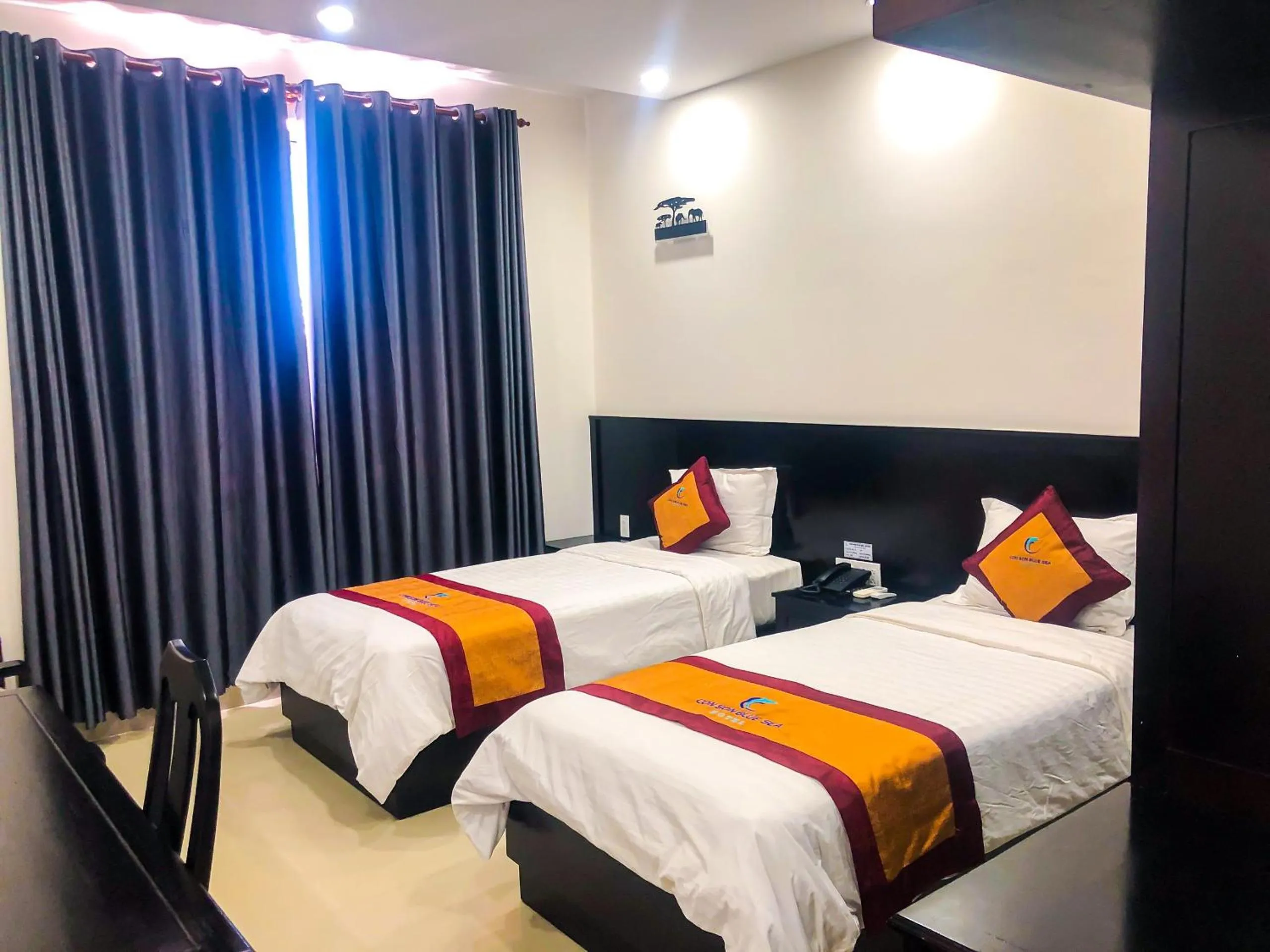 Bed in Con Son Blue Sea Hotel