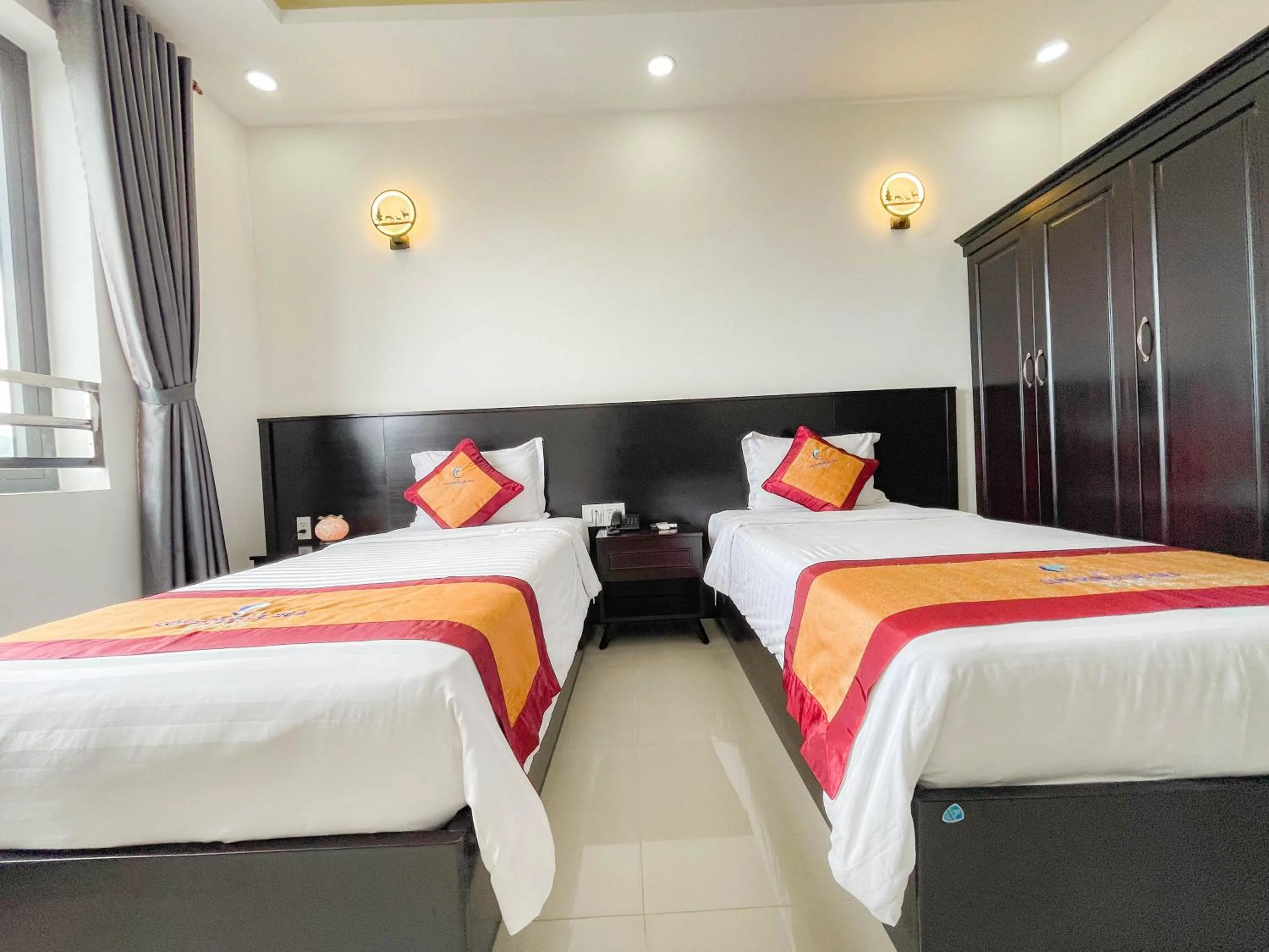 Bed in Con Son Blue Sea Hotel