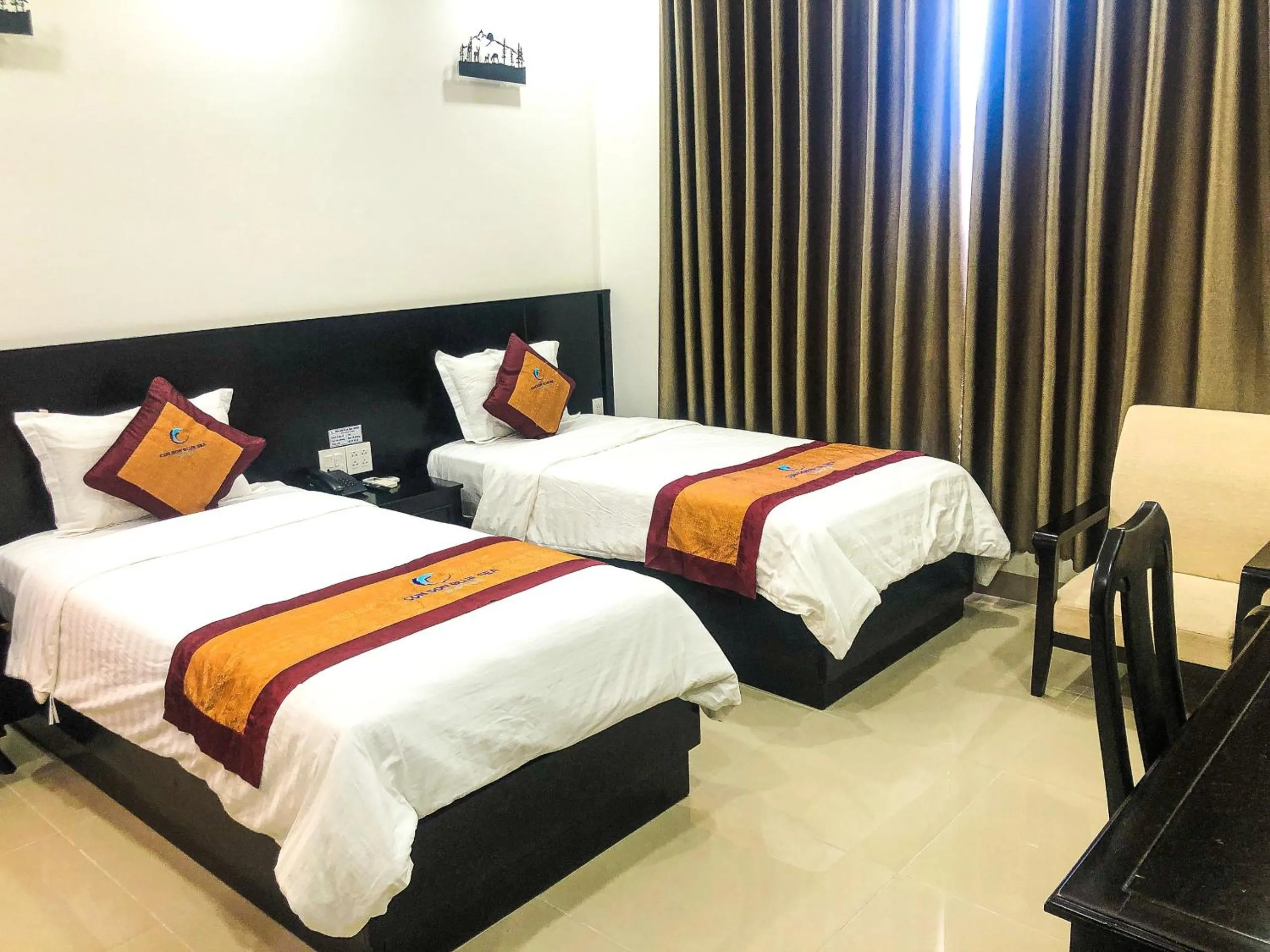 Bed in Con Son Blue Sea Hotel