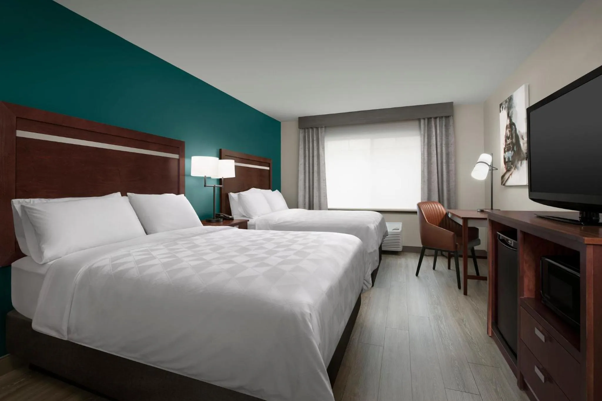 Photo of the whole room, Bed in Holiday Inn & Suites Durango Downtown by IHG