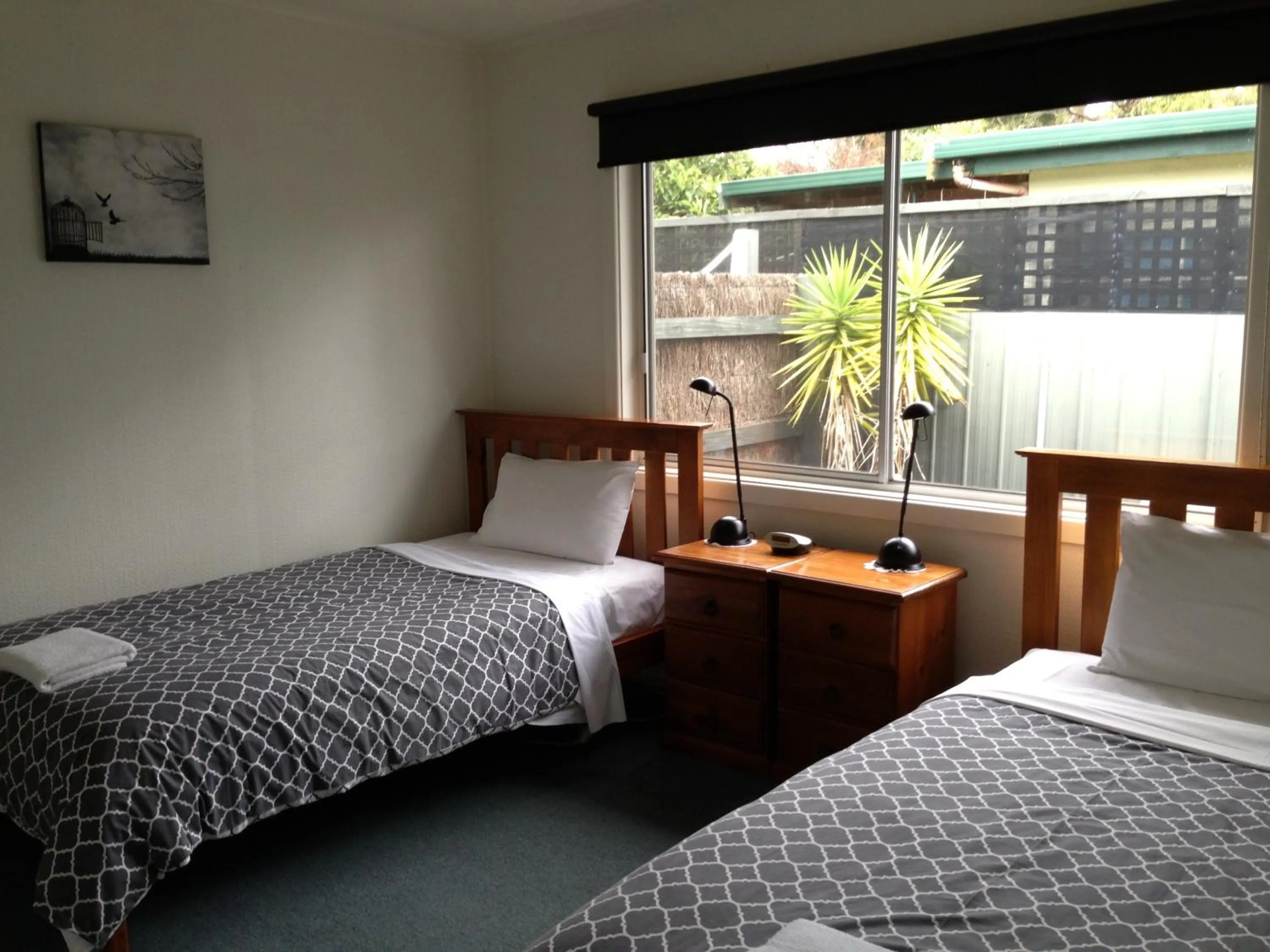Bed in Phillip Island Cottages