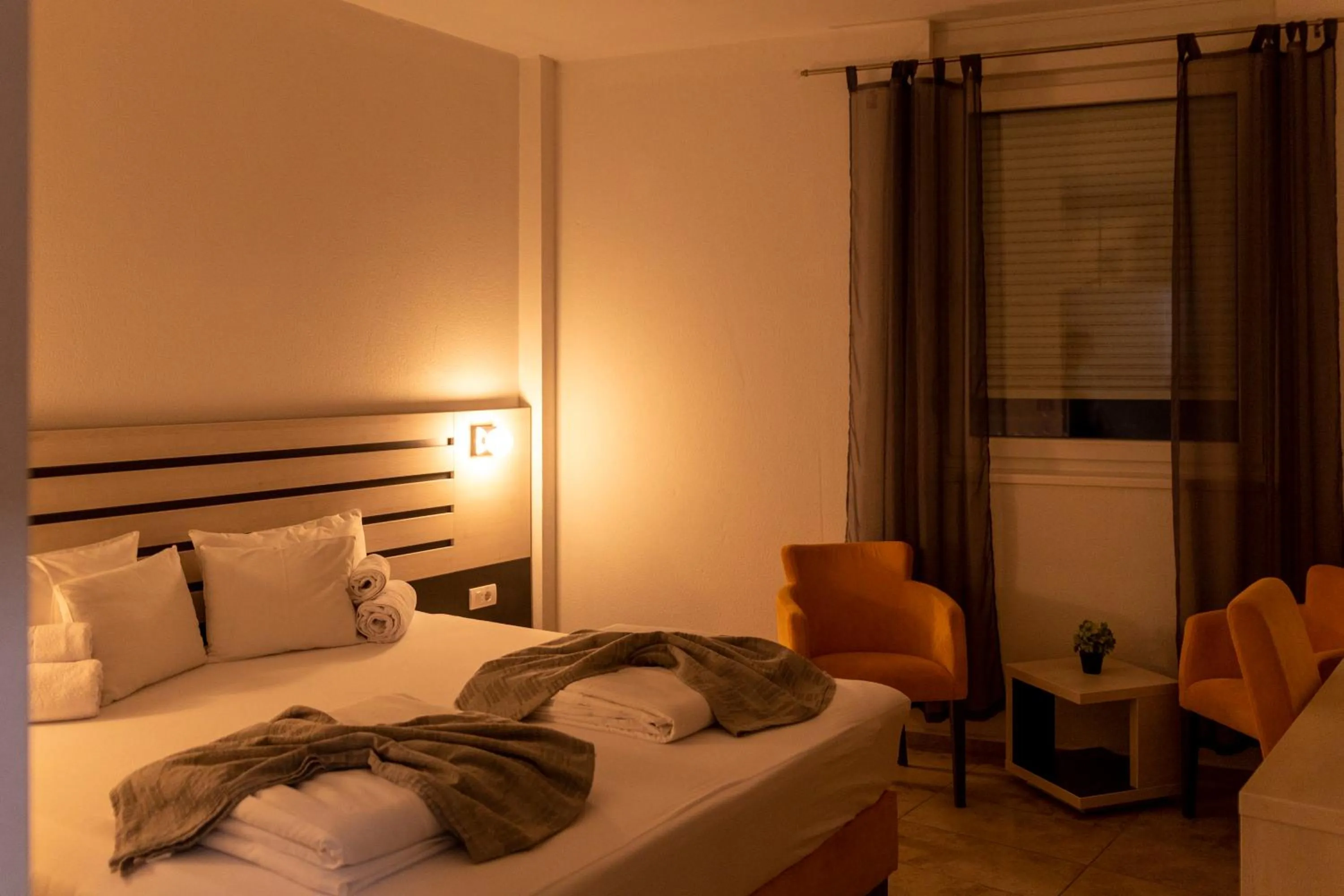 Bed in Garni Hotel 11tica DM