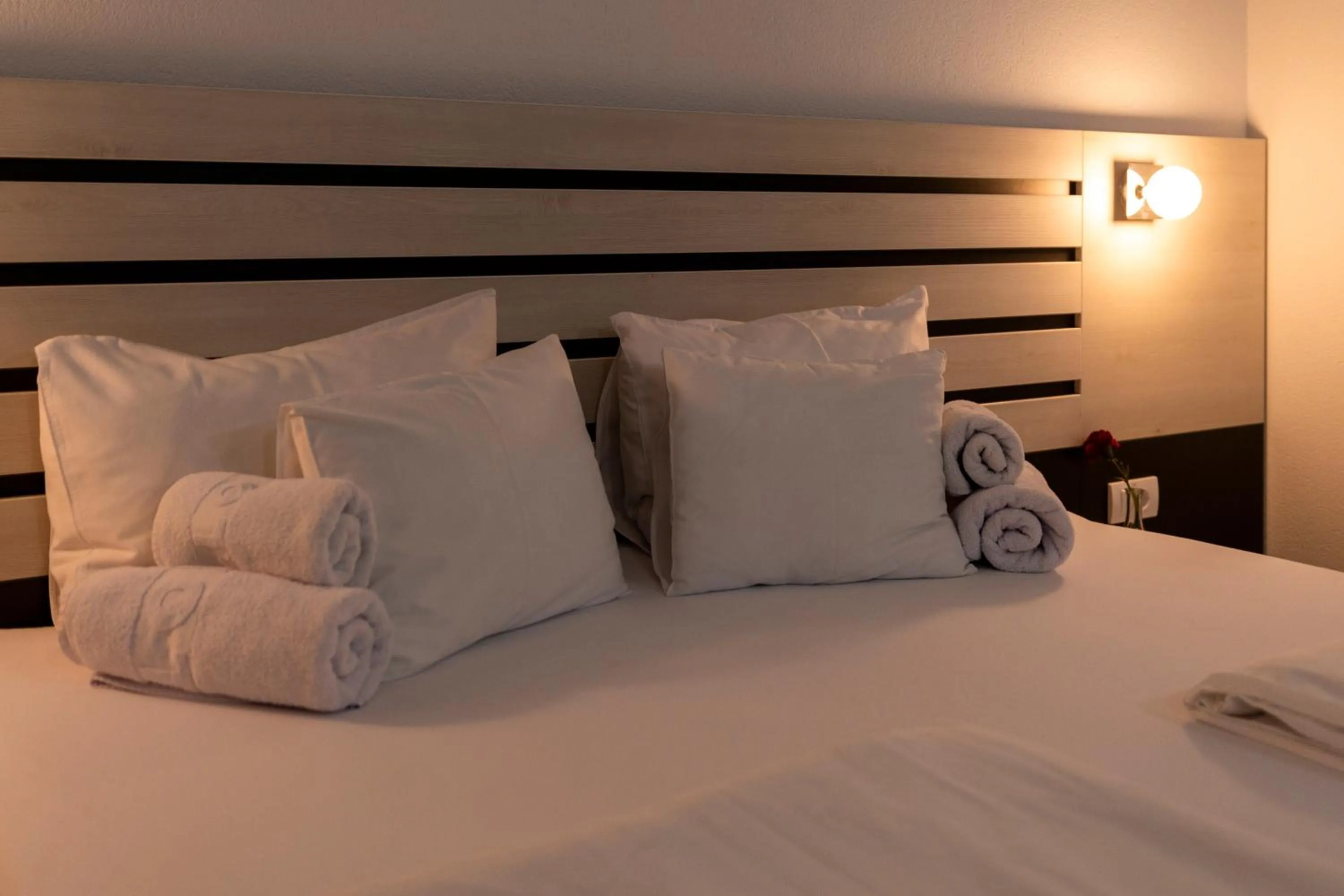 Bed in Garni Hotel 11tica DM