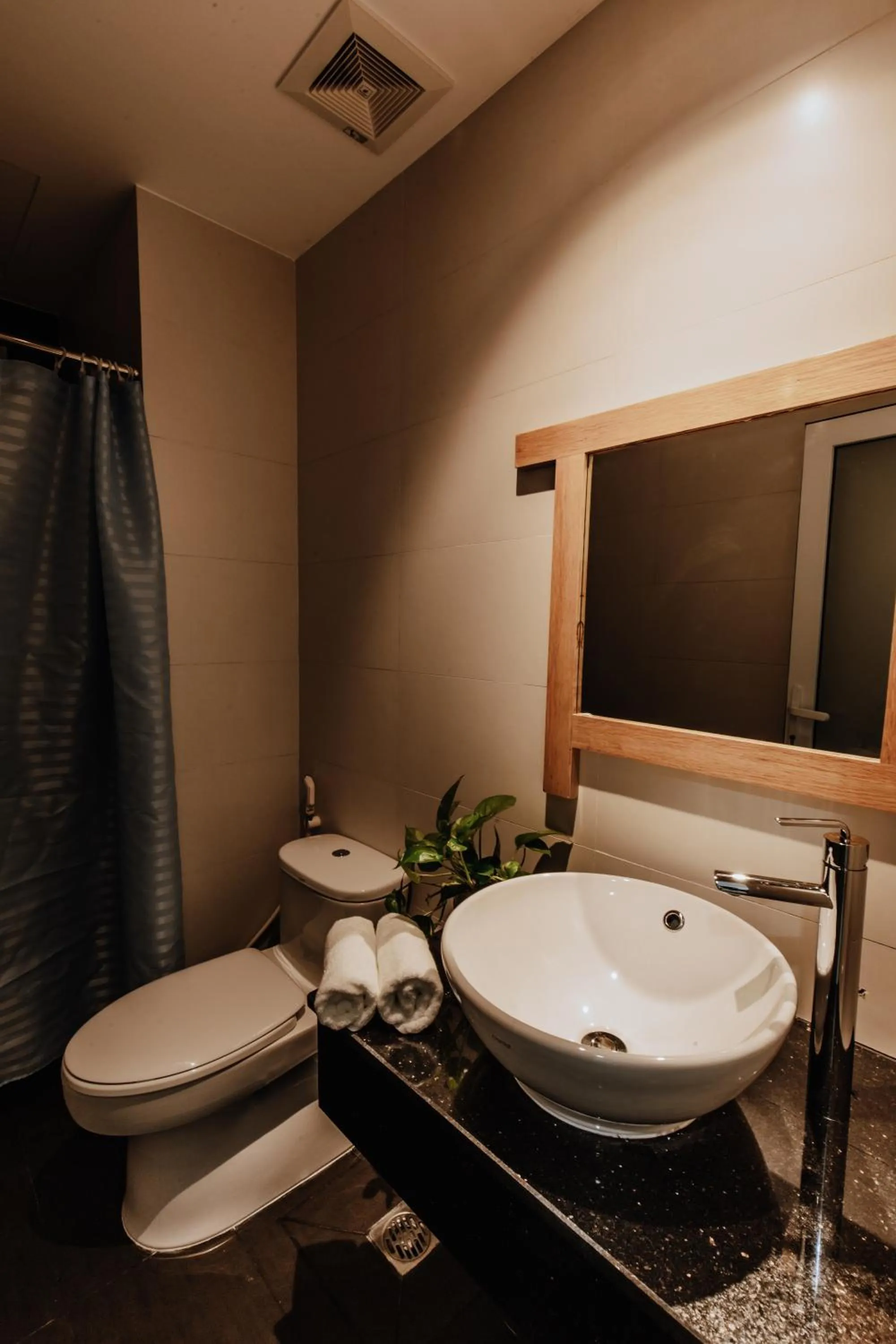 Bathroom in Olivia Hotel and Apartment