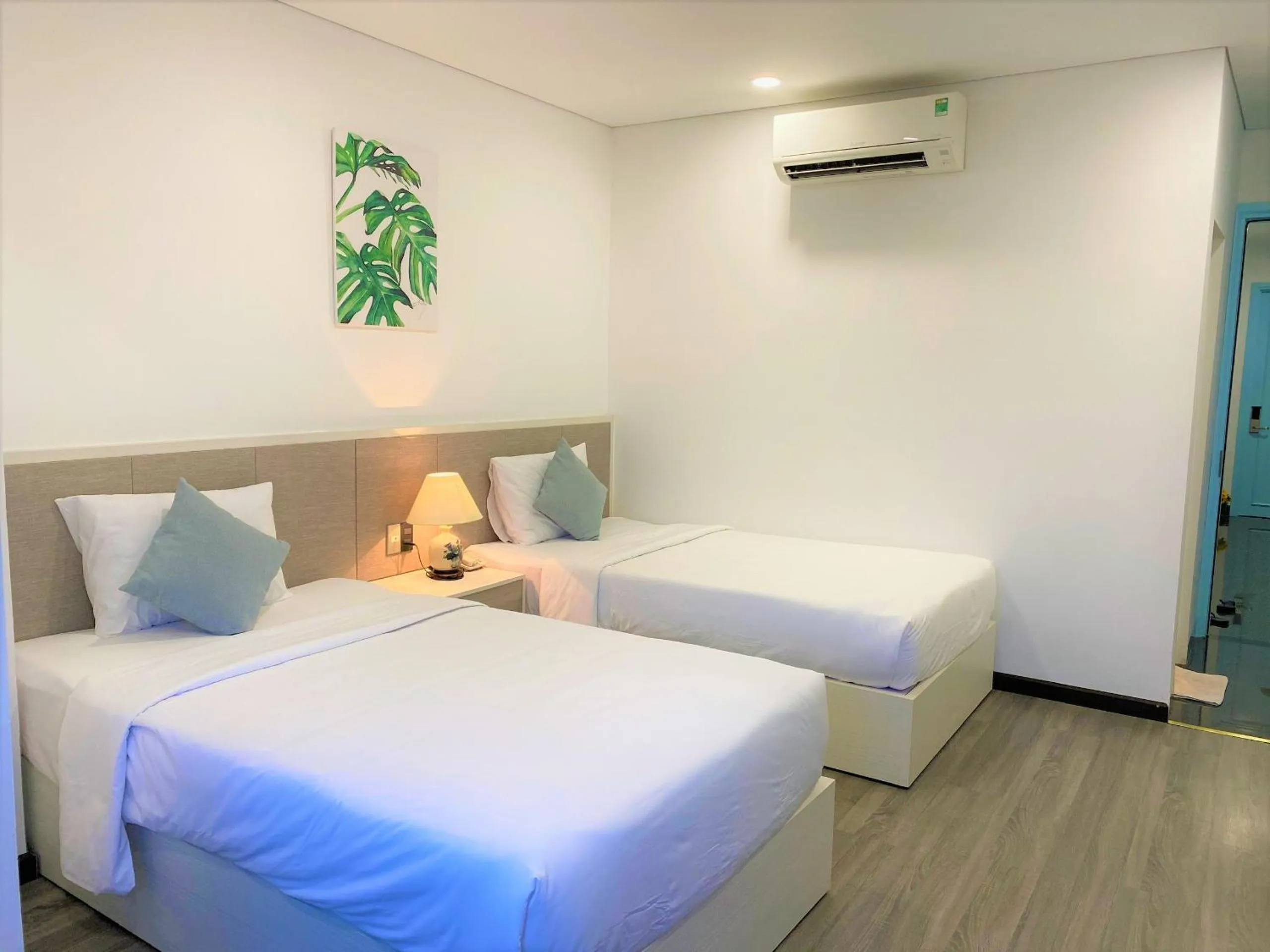 Bed in Olivia Hotel and Apartment