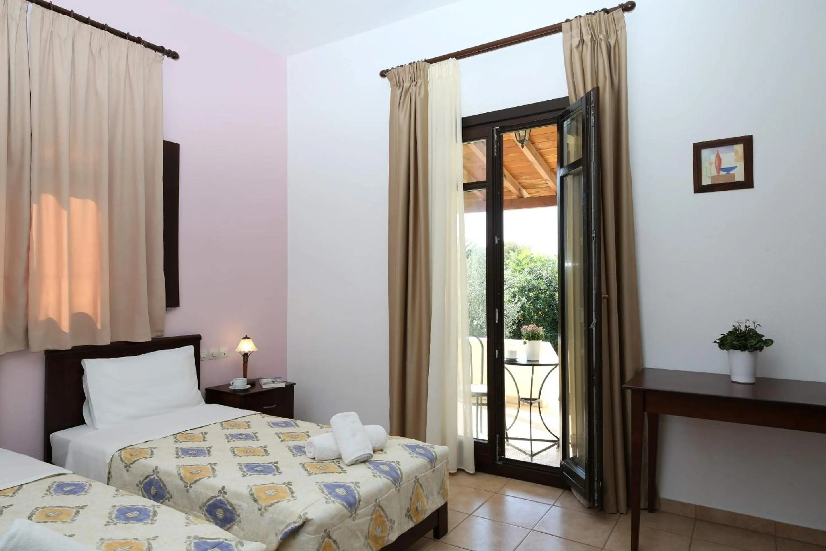 Balcony/Terrace, Bed in Palirria Hotel & Studios