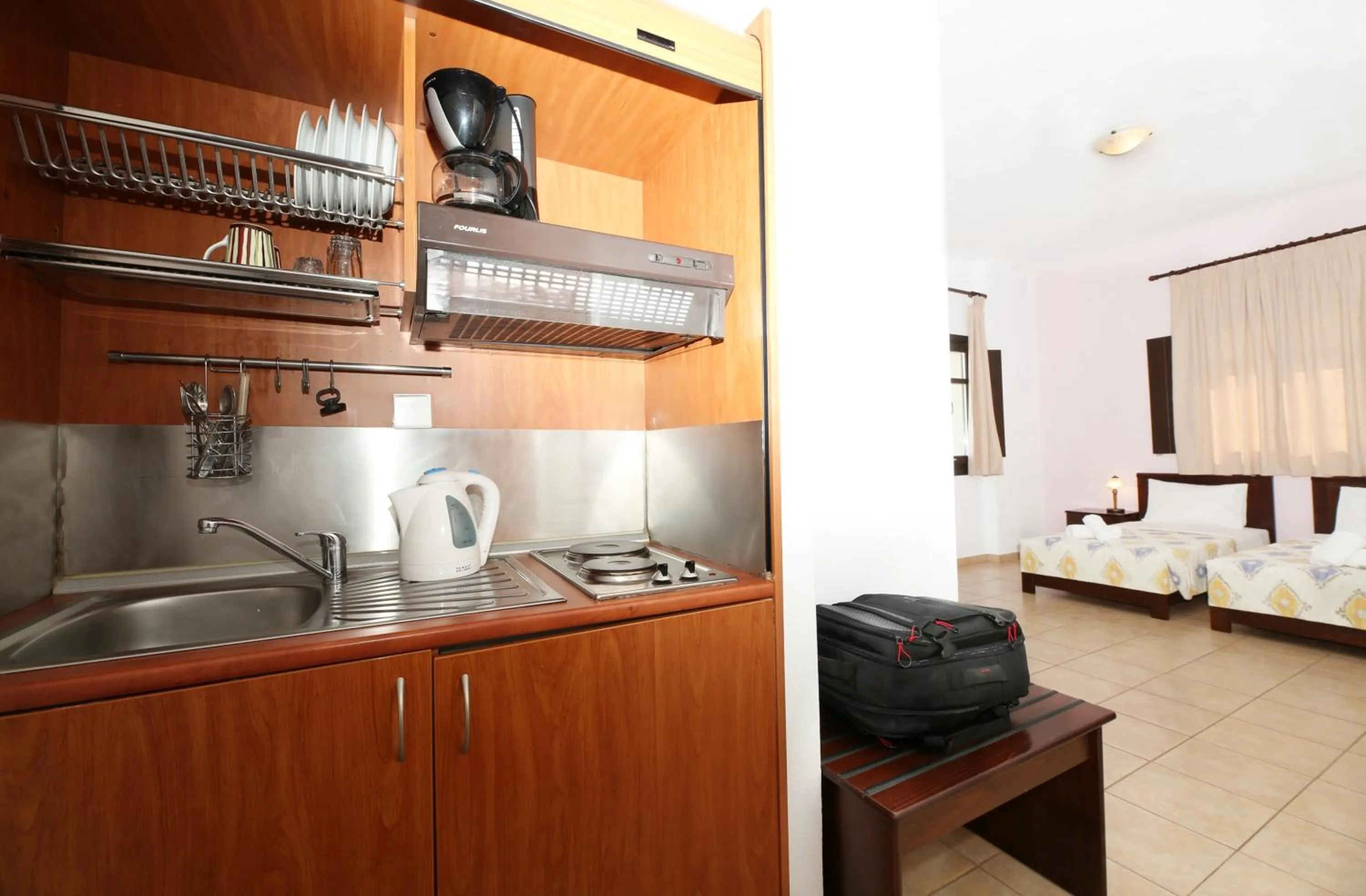 kitchen in Palirria Hotel & Studios