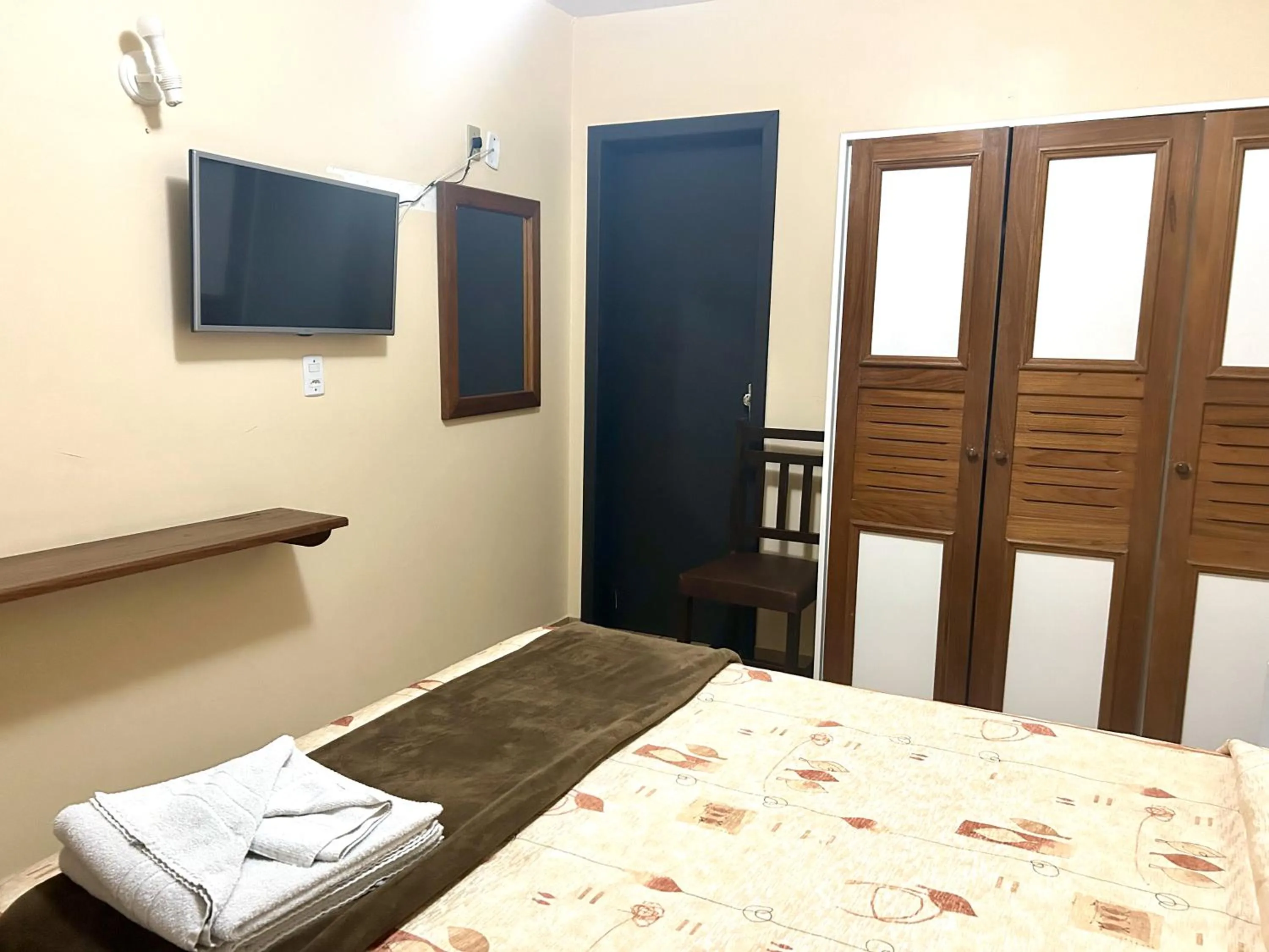 Bed in De Rose Palace Hotel