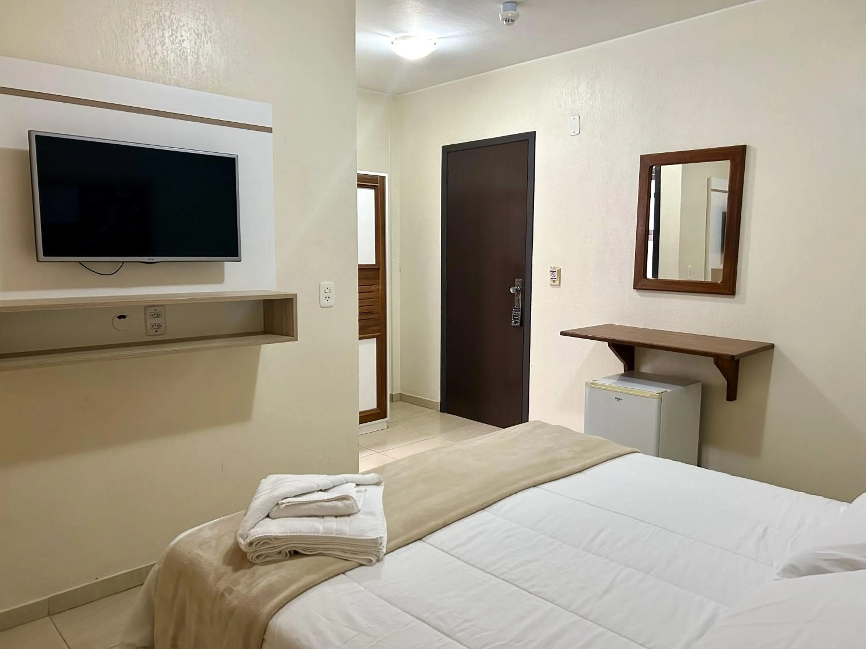 Bed in De Rose Palace Hotel