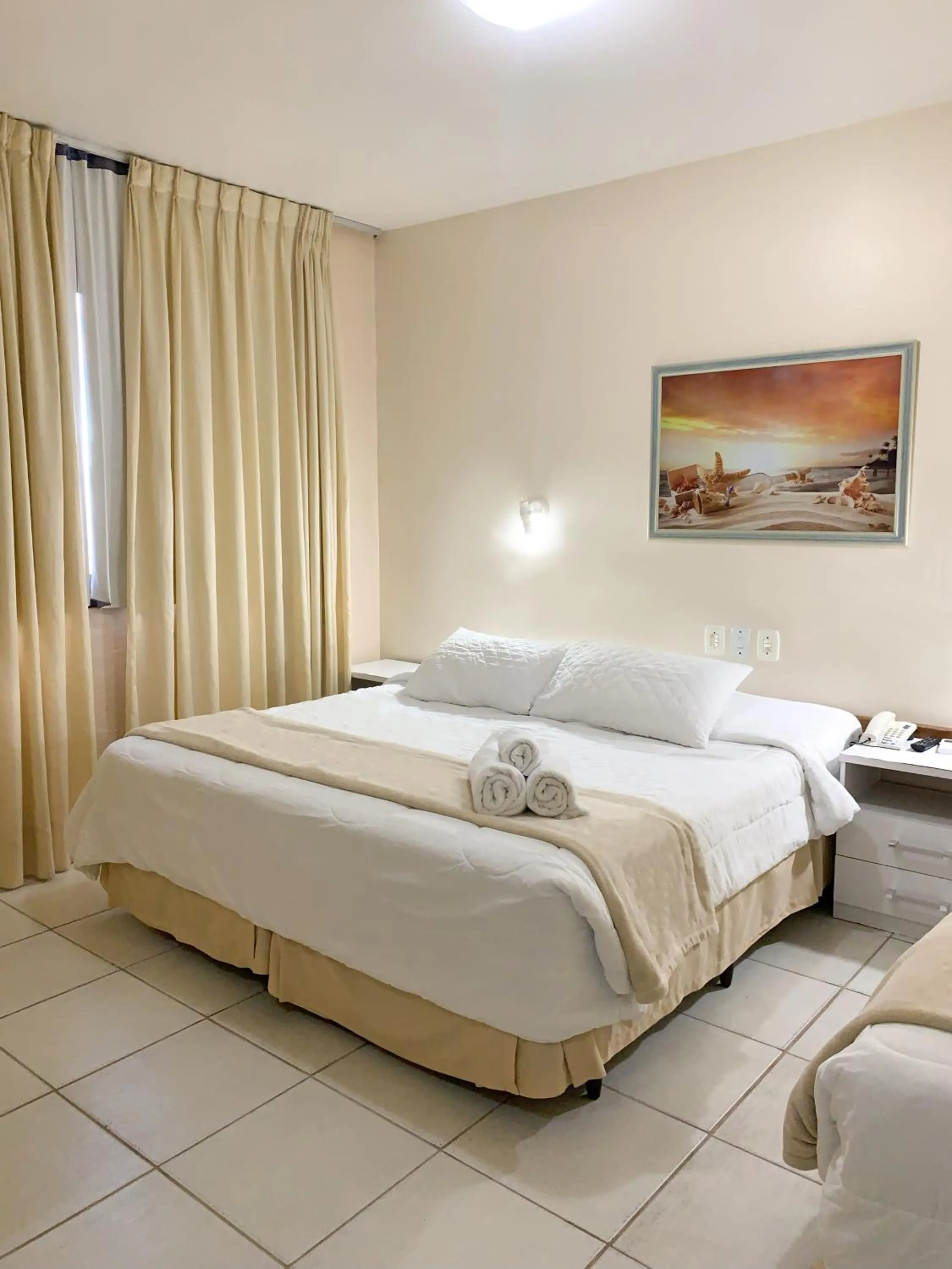 Bed in De Rose Palace Hotel