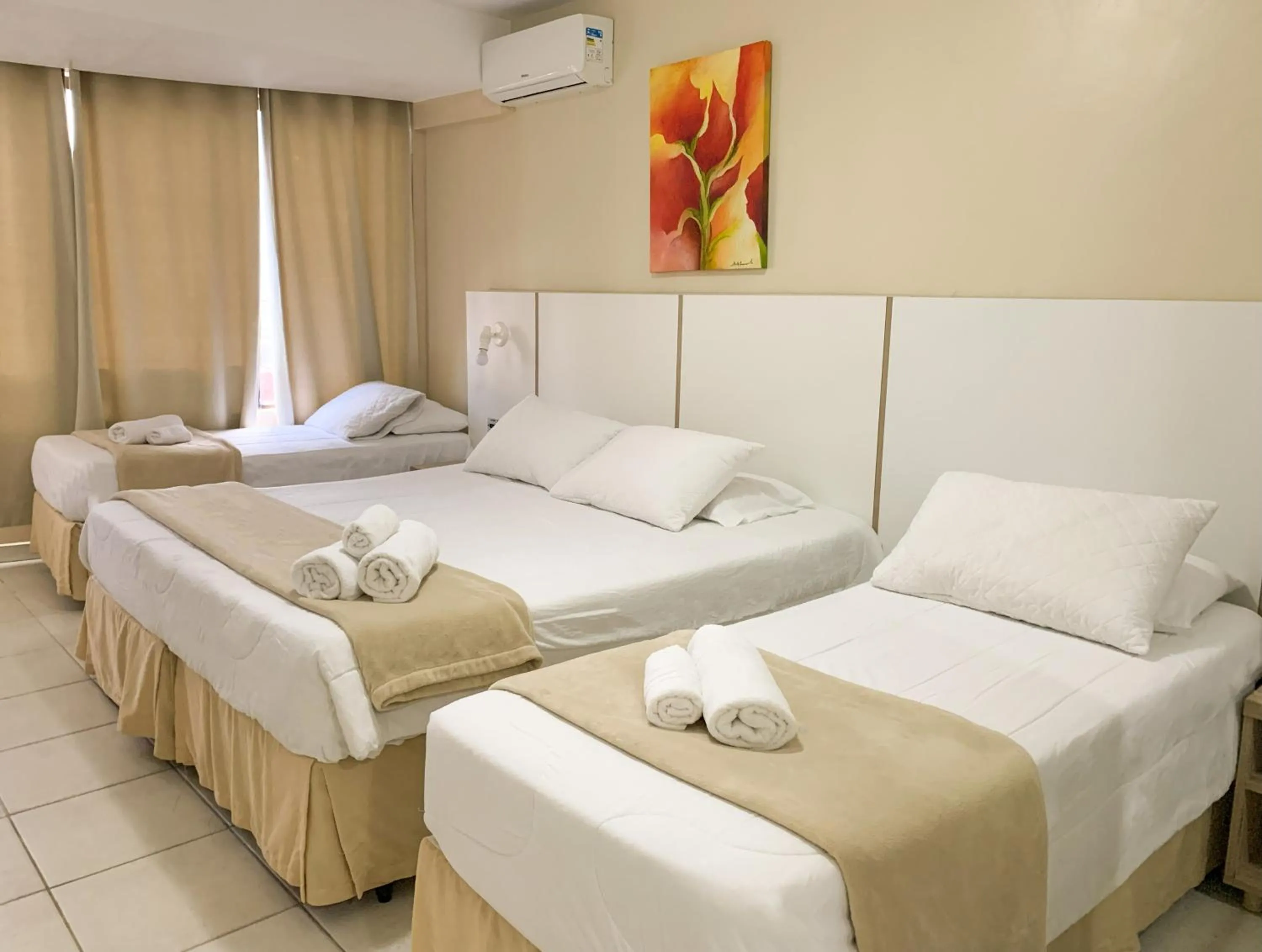 Bed in De Rose Palace Hotel