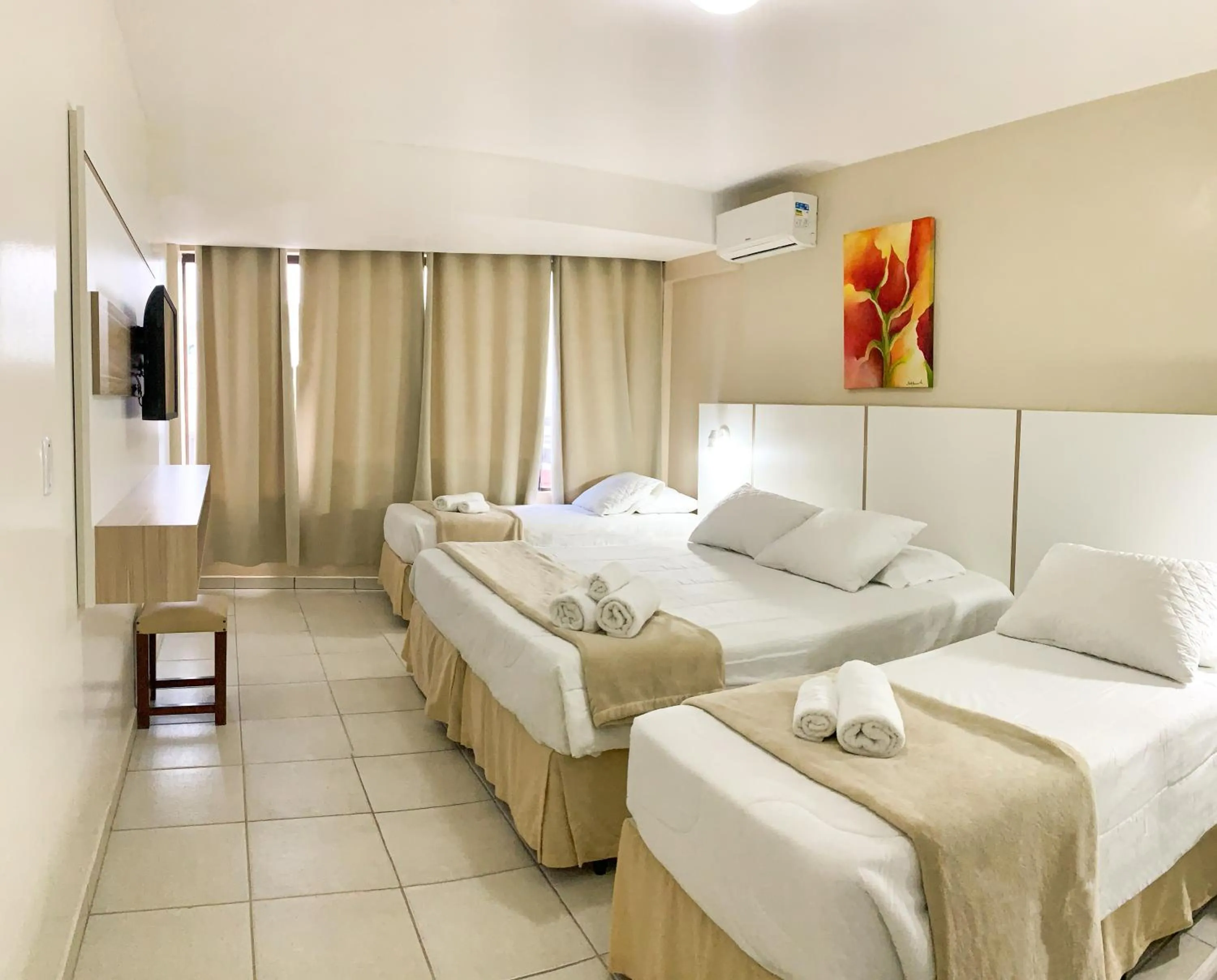 Bed in De Rose Palace Hotel