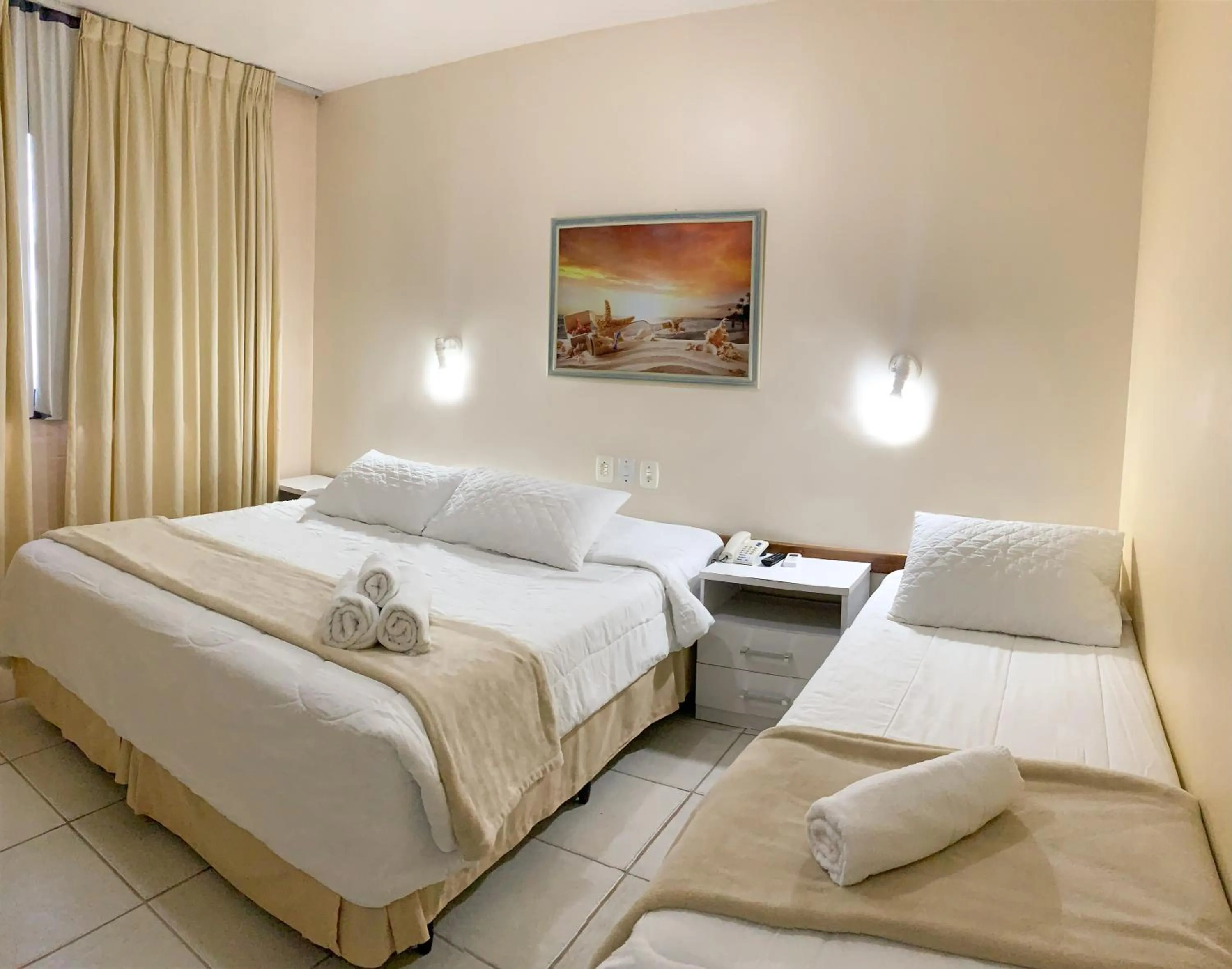 Bed in De Rose Palace Hotel