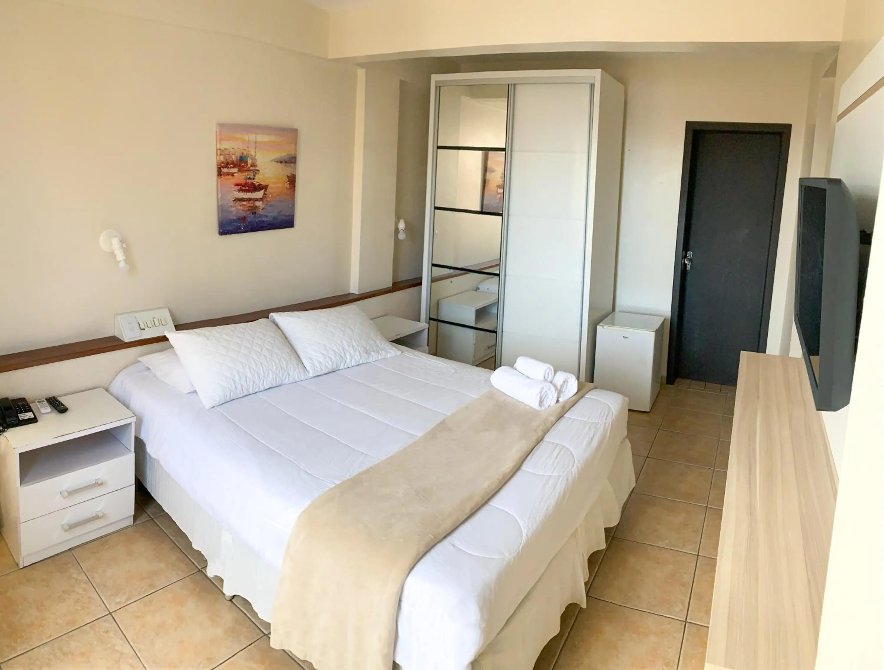 Bed in De Rose Palace Hotel