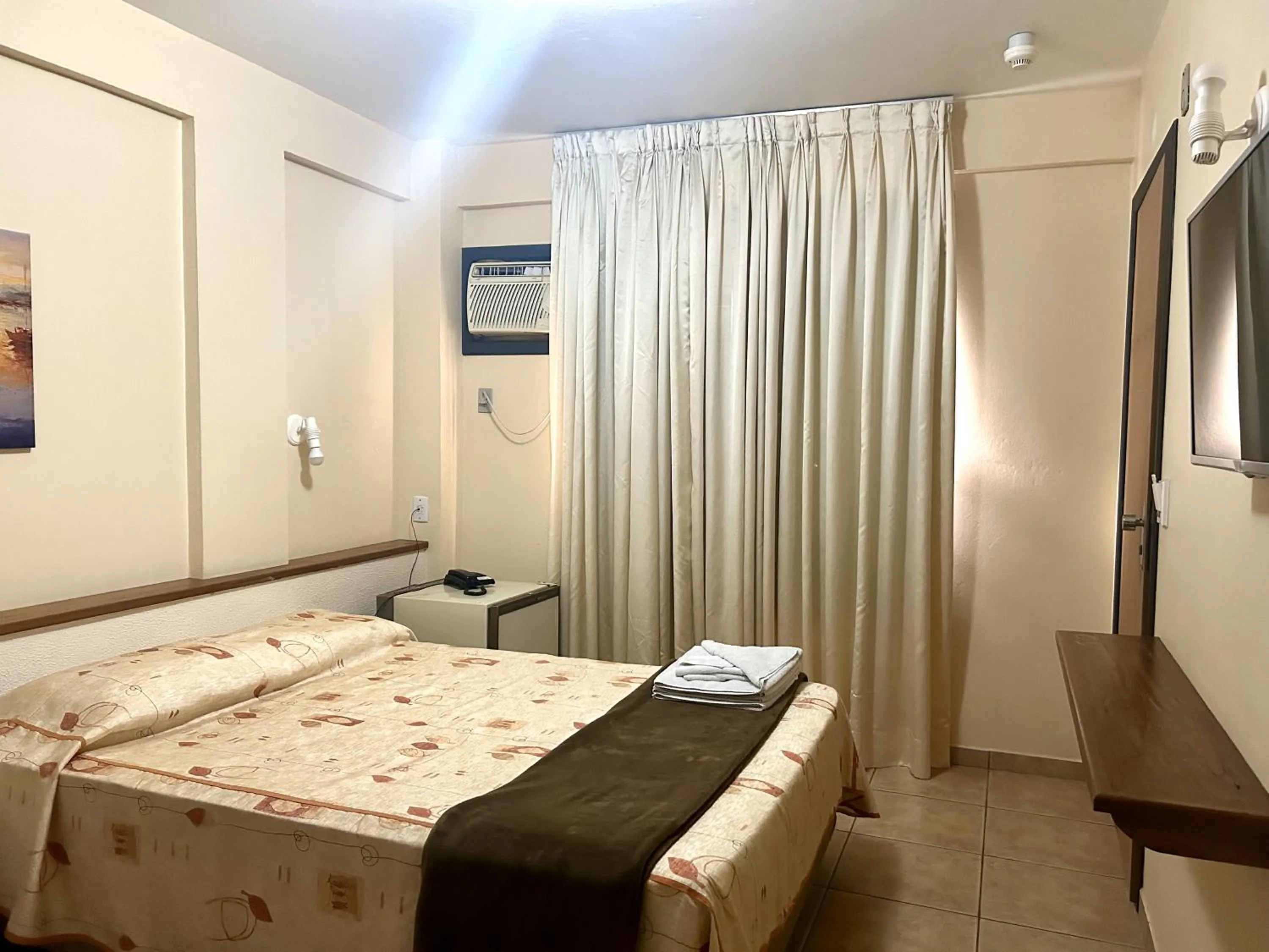 Bed in De Rose Palace Hotel