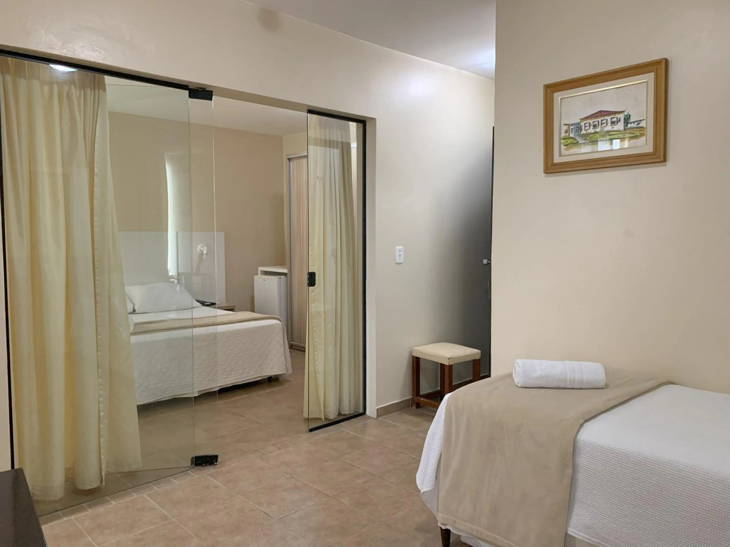 Bed in De Rose Palace Hotel