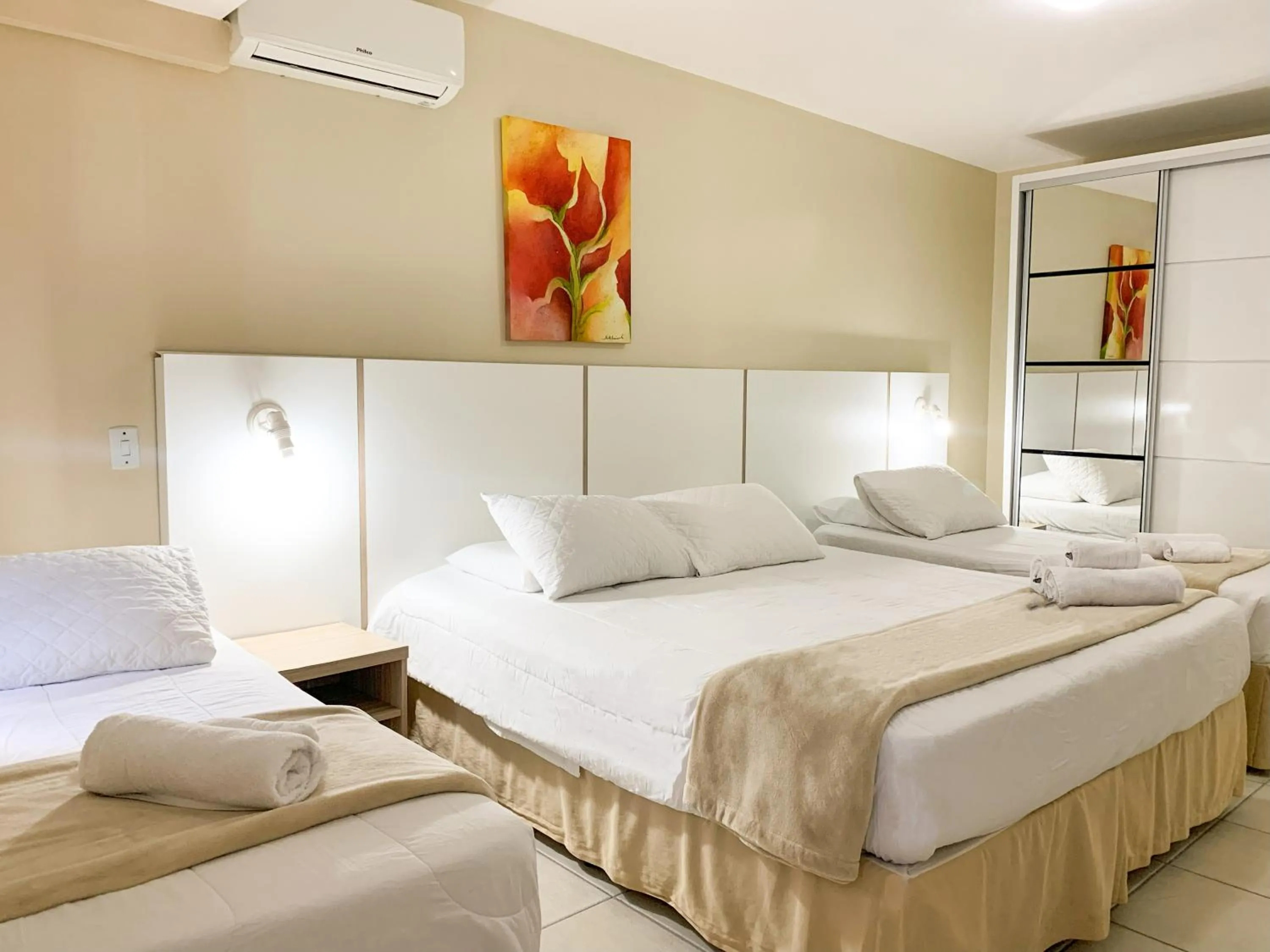 Bed in De Rose Palace Hotel