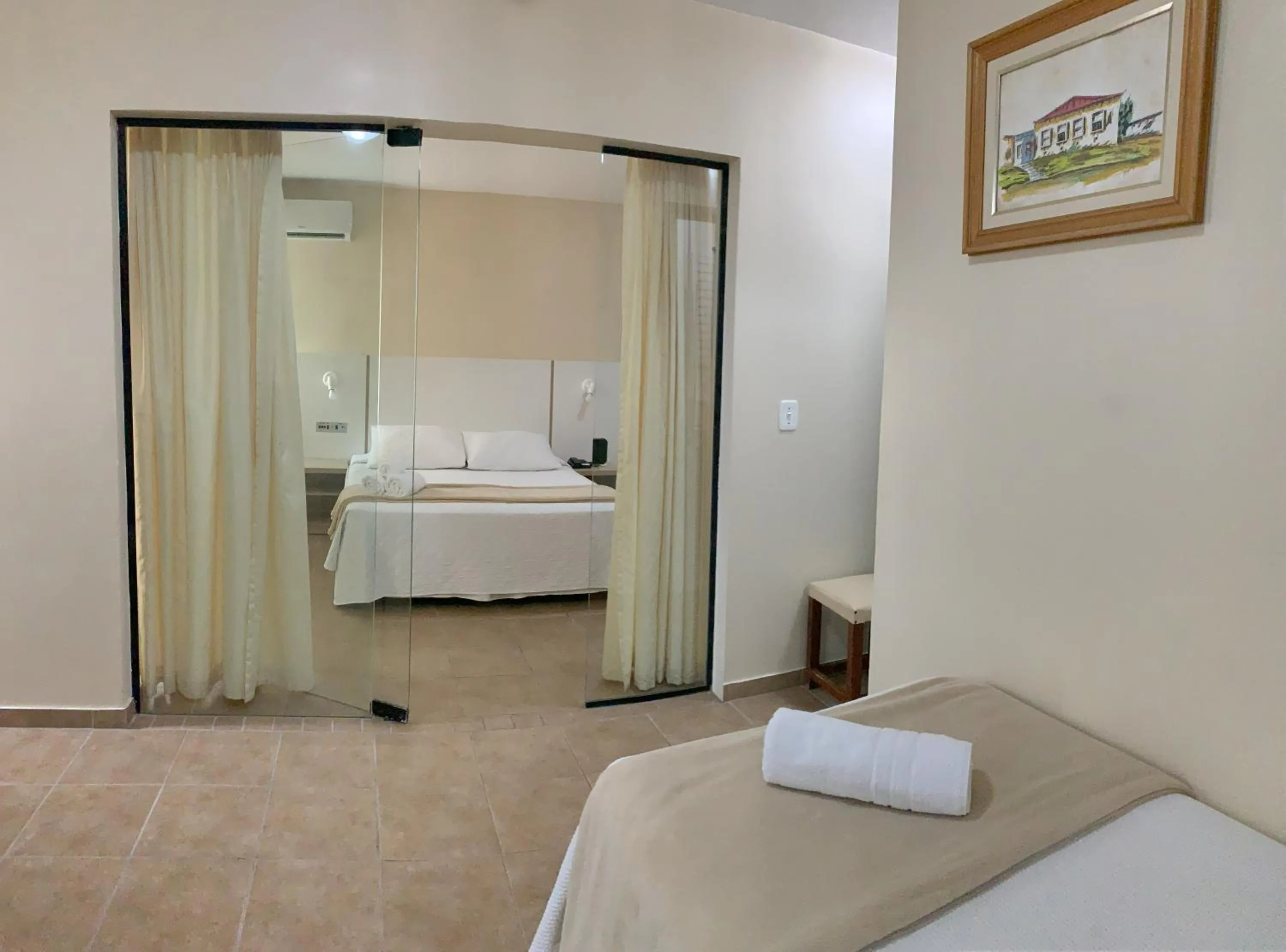 Bed in De Rose Palace Hotel