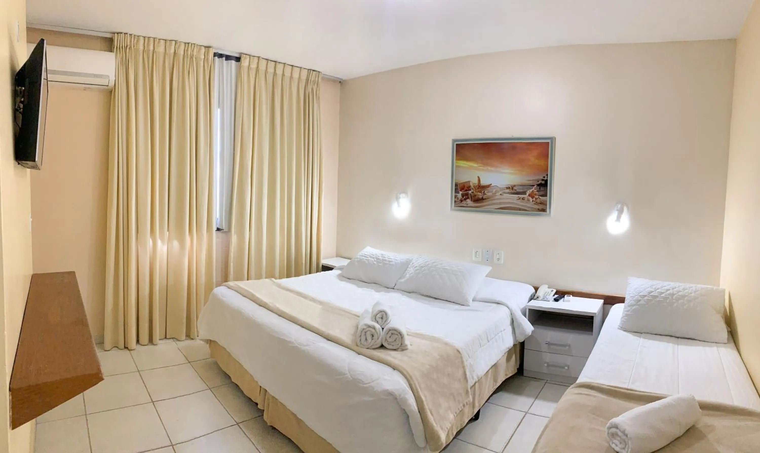 Bed in De Rose Palace Hotel