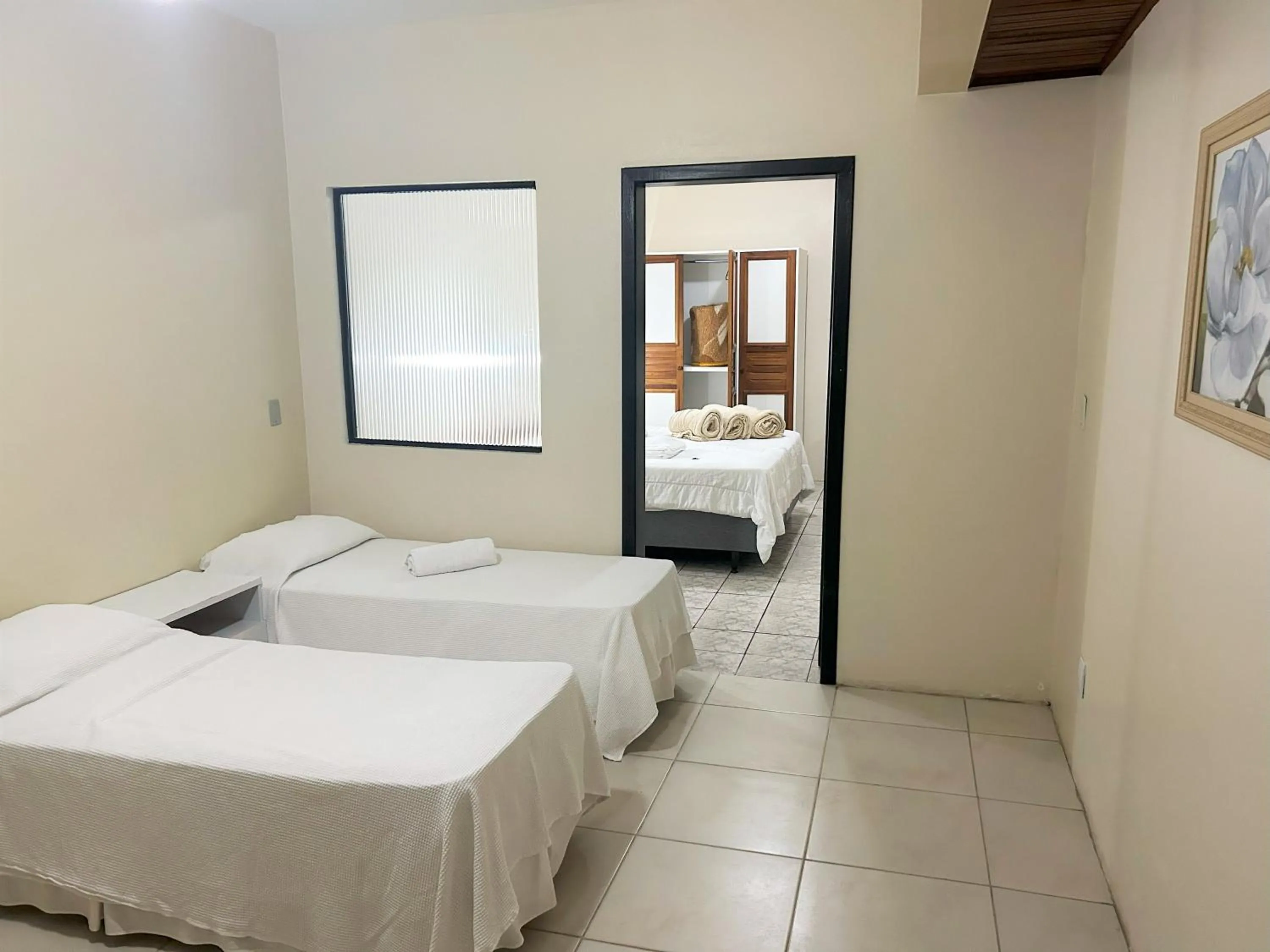 Bed in De Rose Palace Hotel