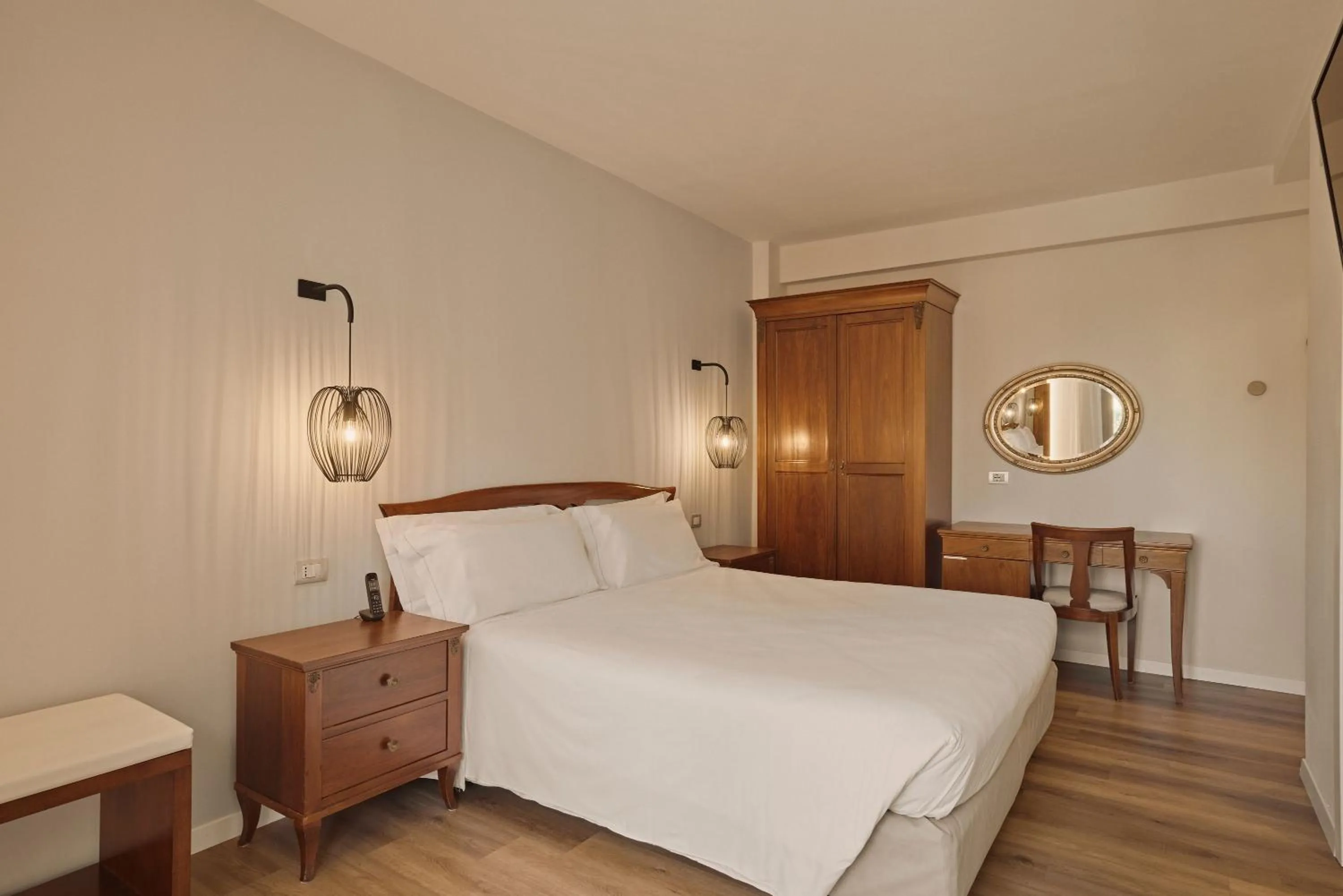 Bed in Hotel Le Mura