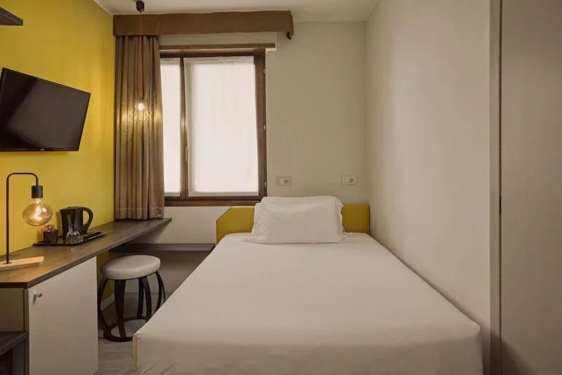 Bed in Hotel Le Mura