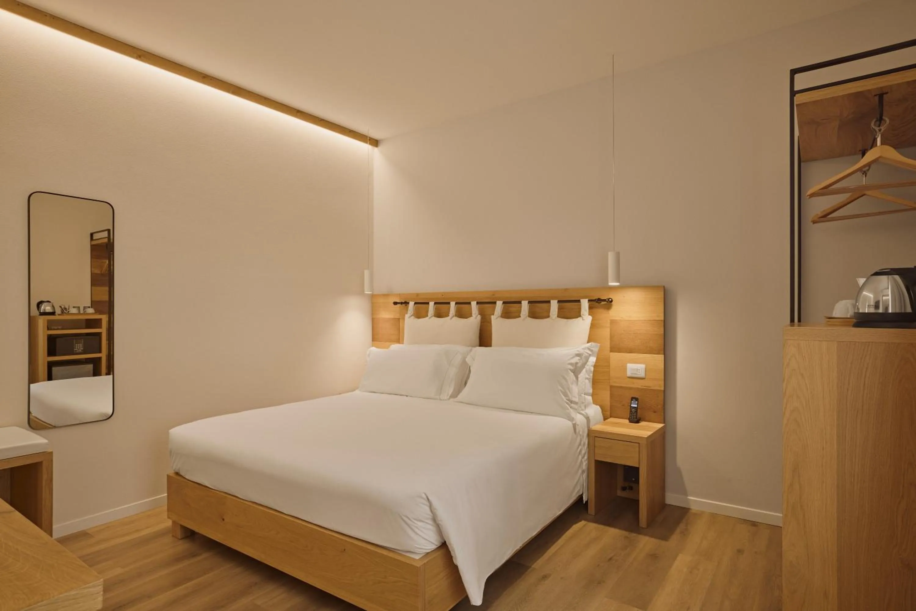 Bed in Hotel Le Mura