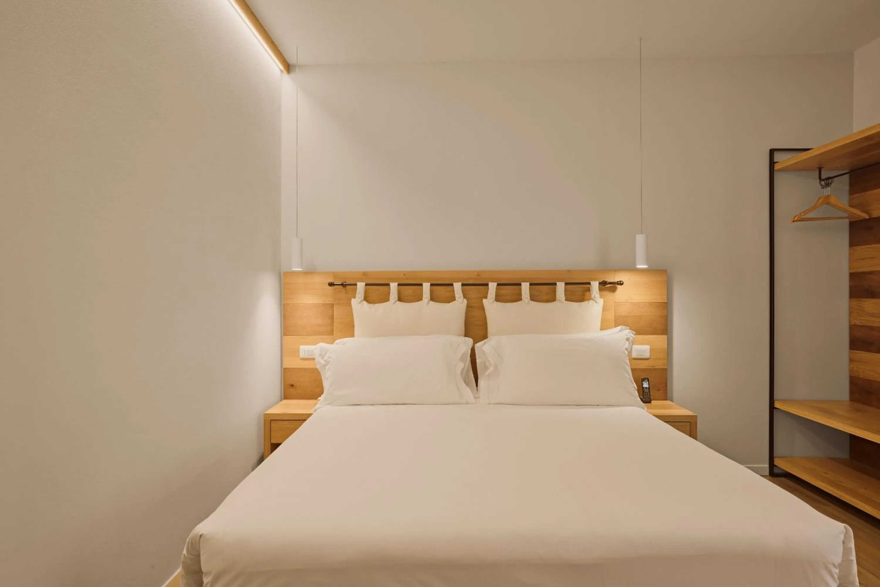 Bed in Hotel Le Mura