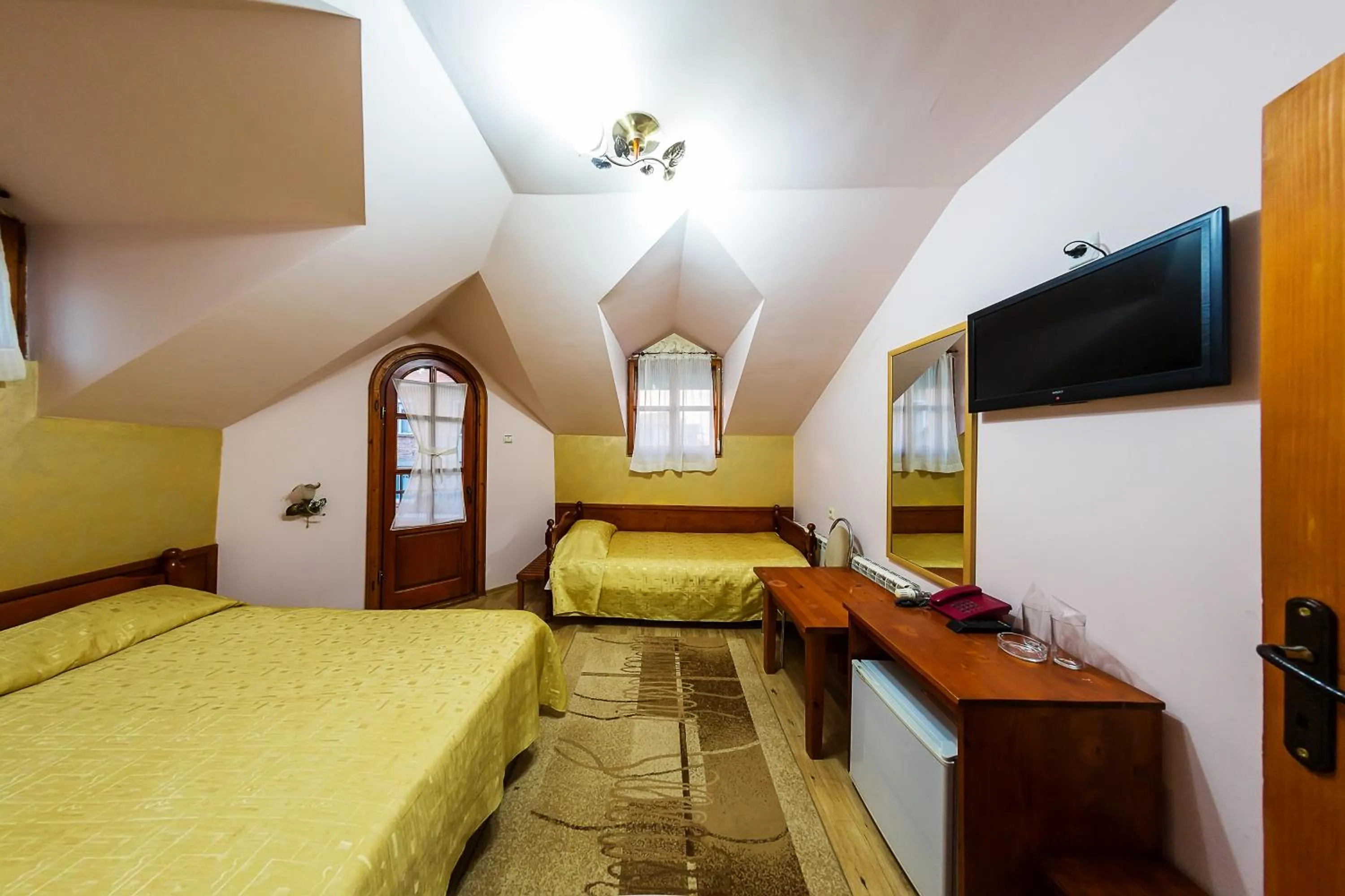 Bed in Family Hotel Ogi