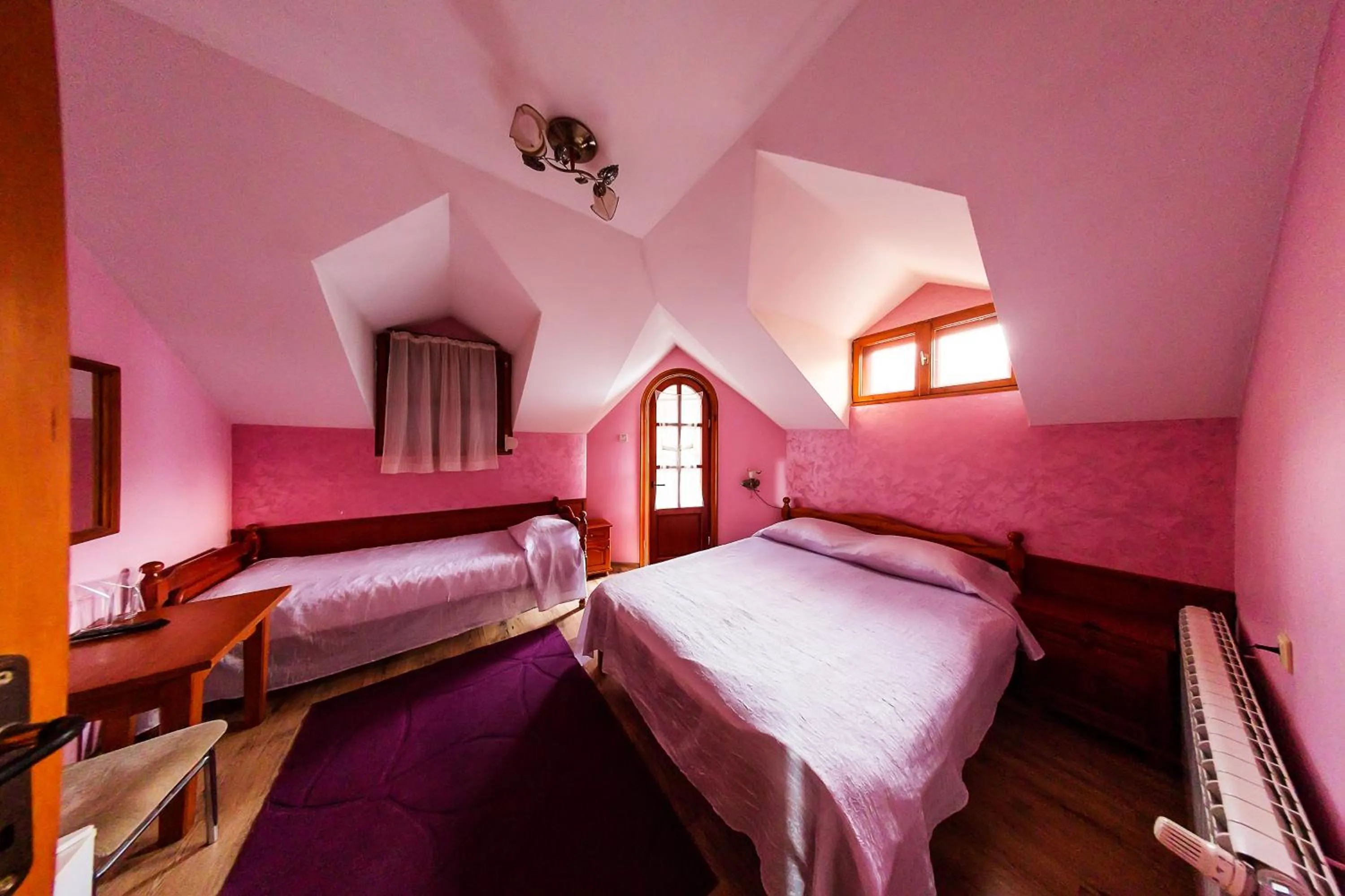 Bed in Family Hotel Ogi