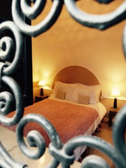 Bed in Riad Magellan Yoga and Spa