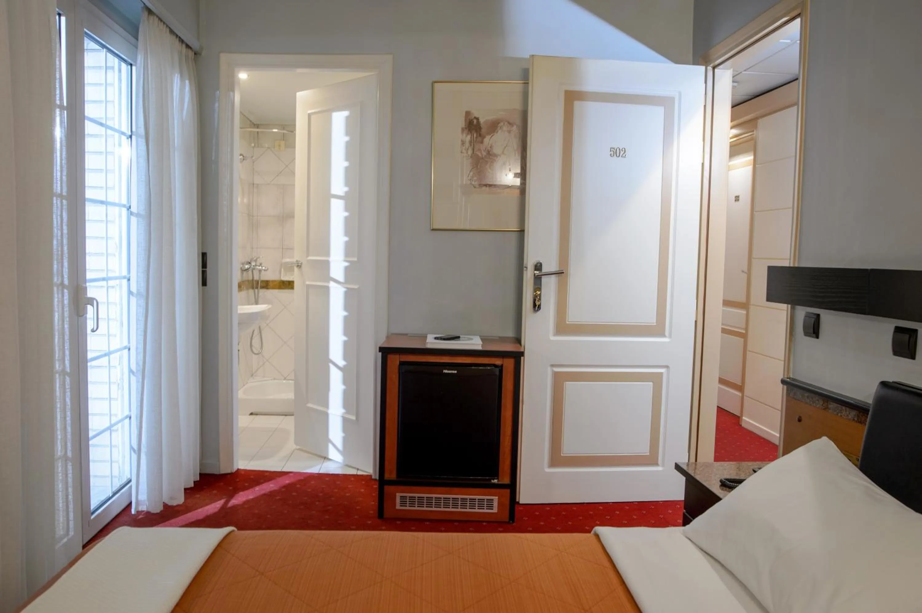 Bed in Victory Inn Hotel