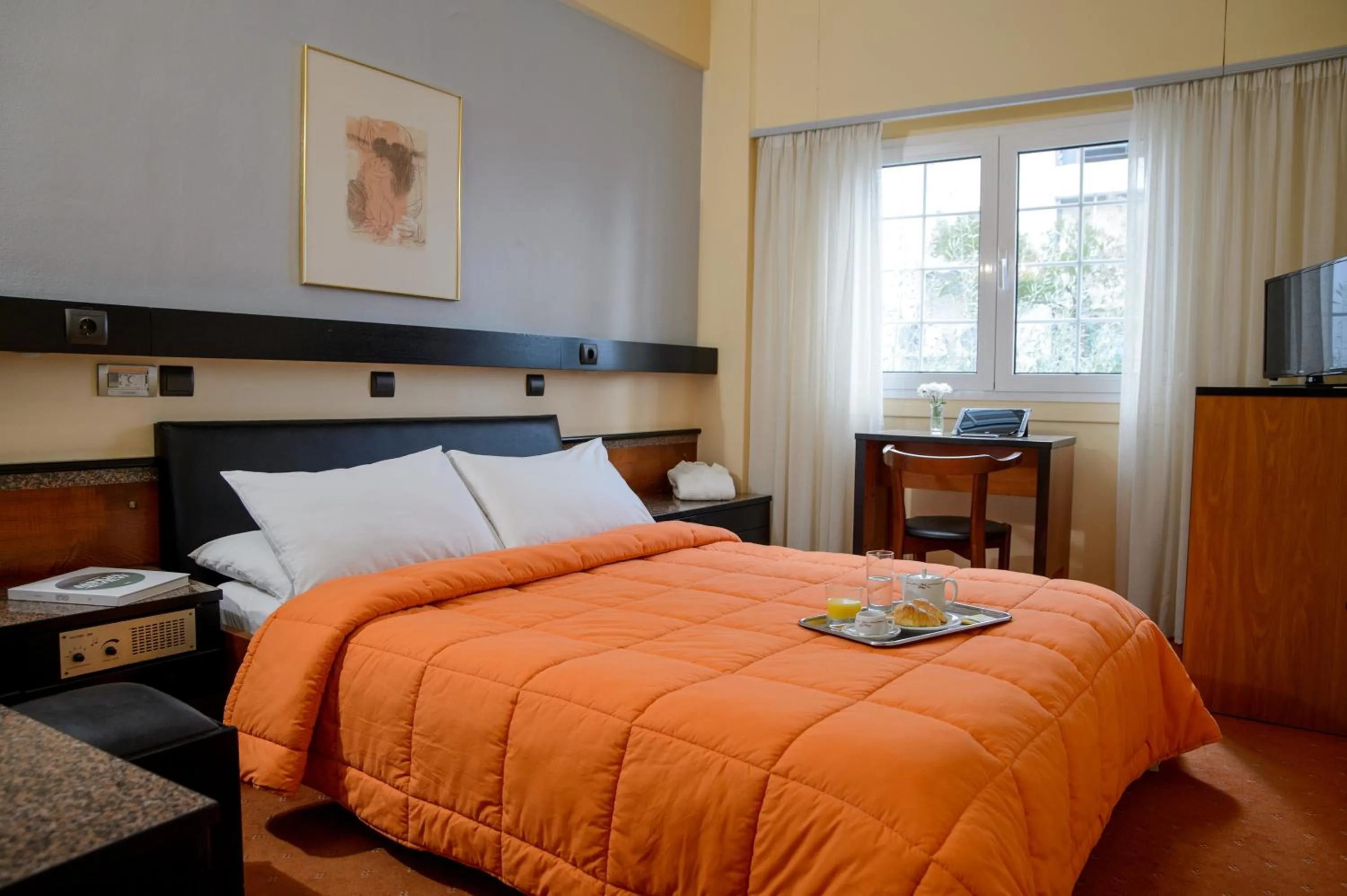 Bed in Victory Inn Hotel