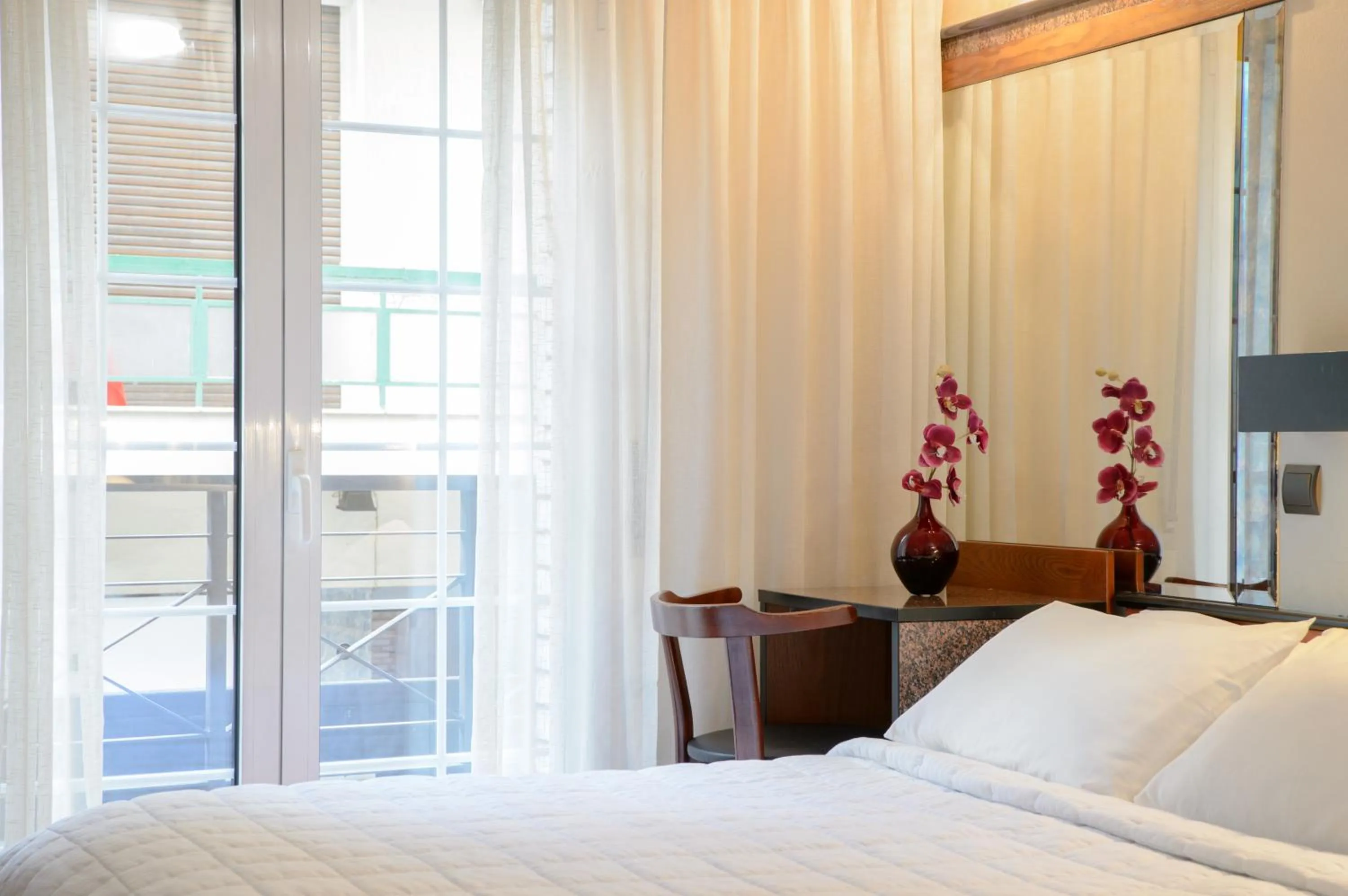 Bed in Victory Inn Hotel