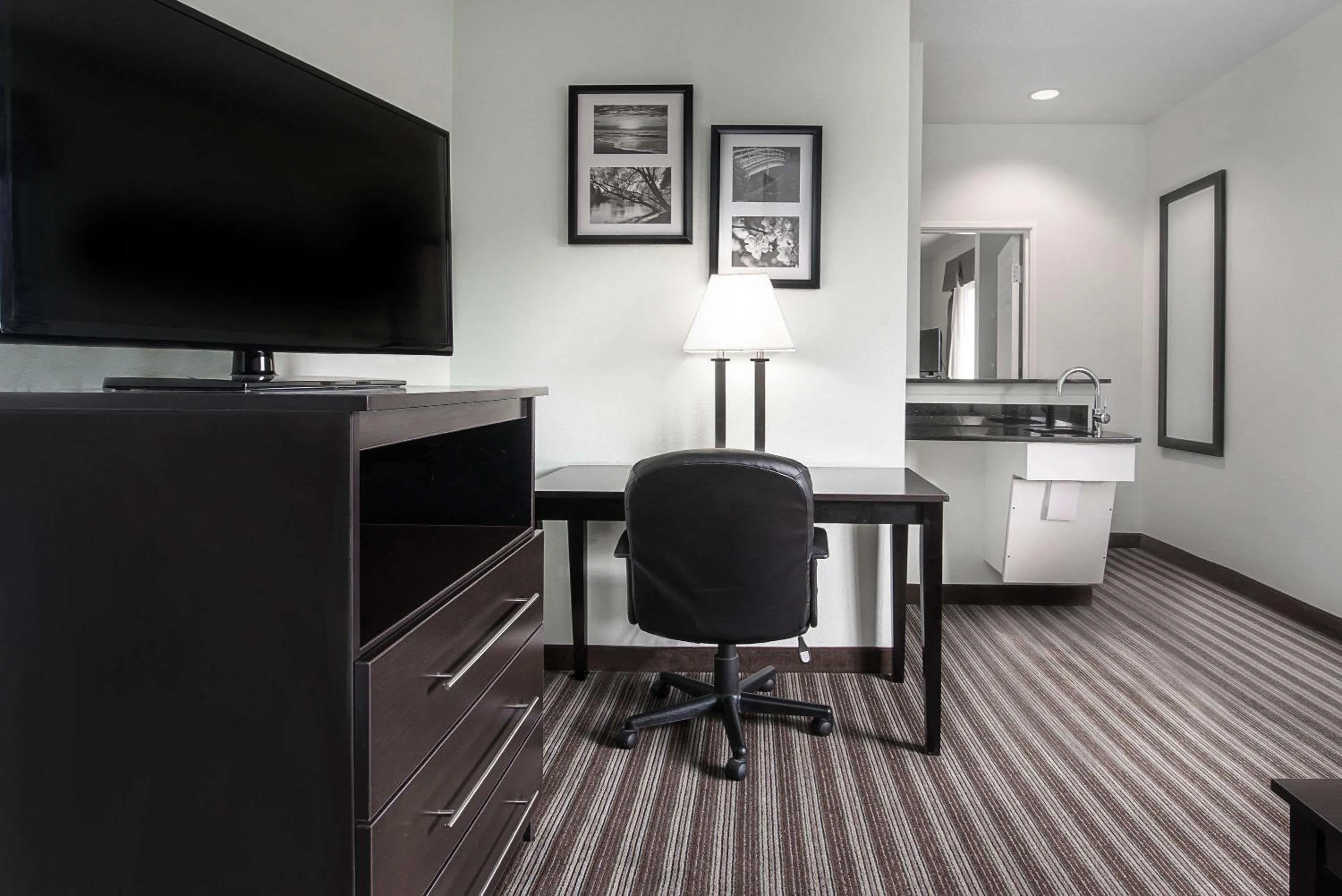 Photo of the whole room in Days Inn & Suites by Wyndham Dallas
