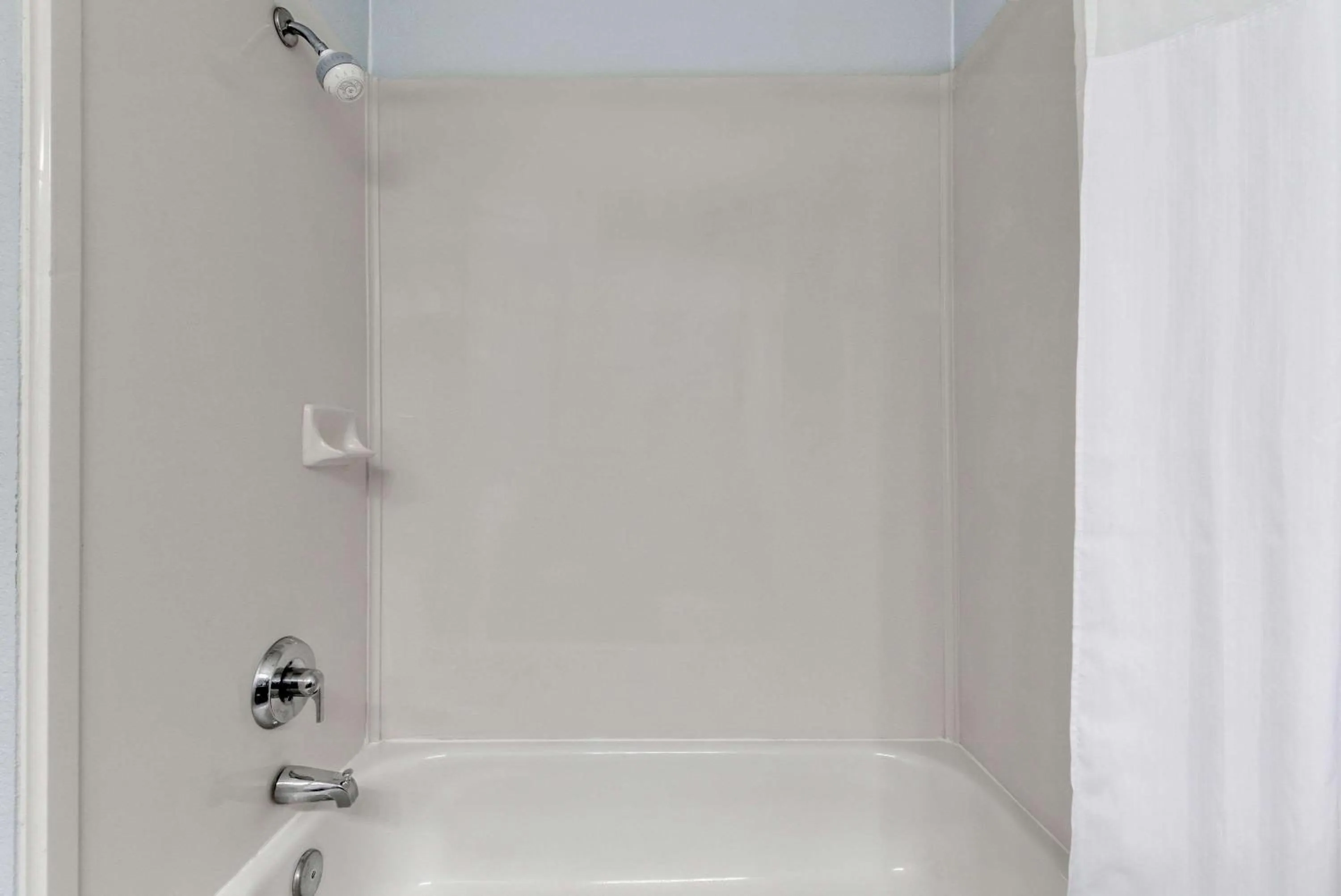 Bathroom in Days Inn & Suites by Wyndham Dallas