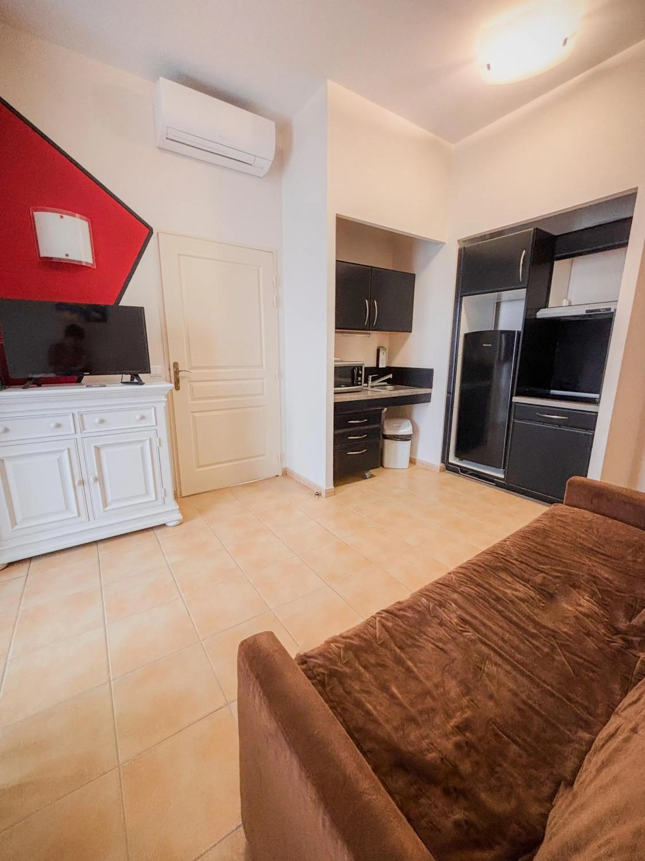 Kitchen or kitchenette in Tulip Inn Honfleur Residence & Spa