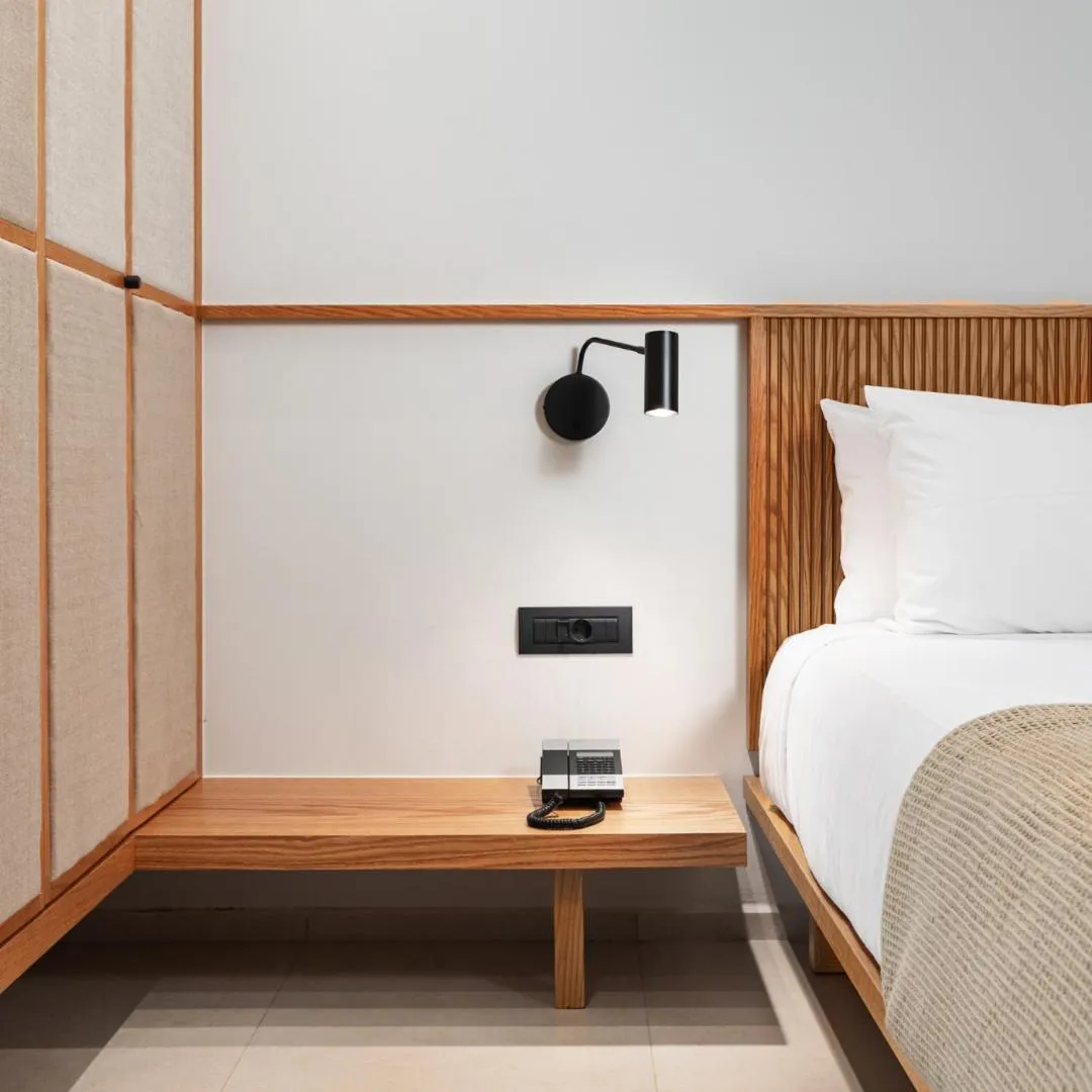 Bed in Caravia Beach Hotel