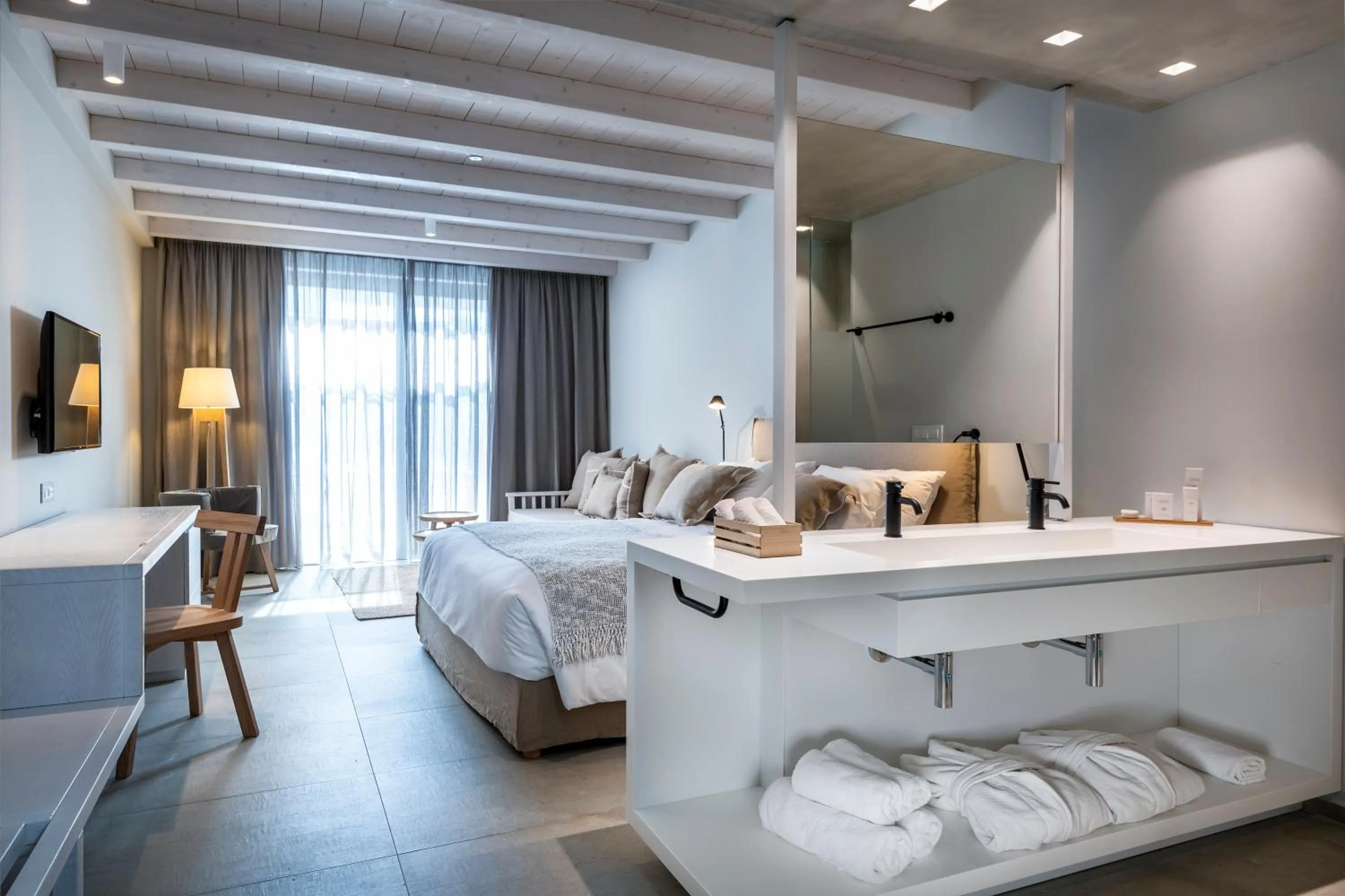 Bed in Caravia Beach Hotel